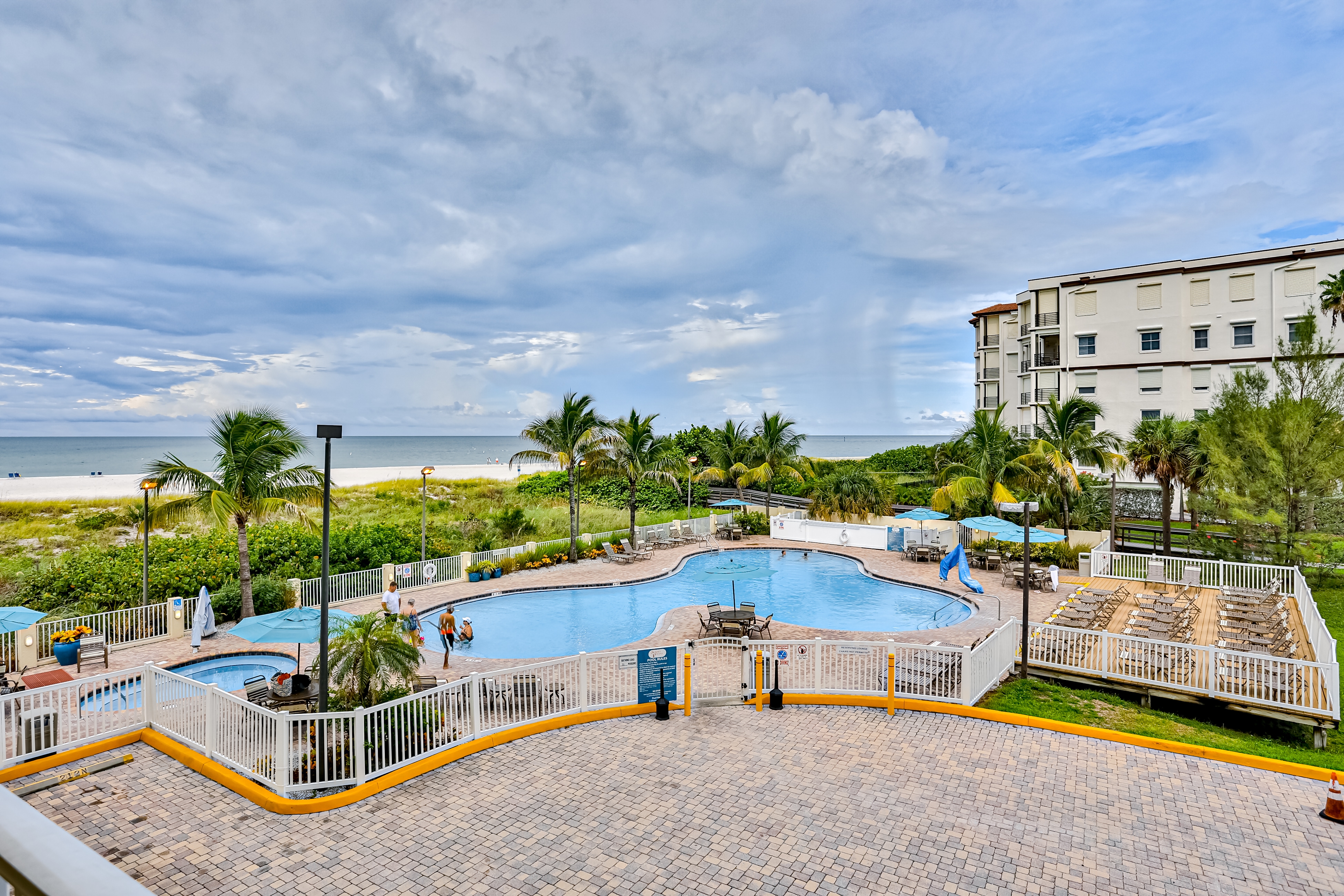 Beachfront and family friendly condo with two pools and hot tub steps to the Gulf