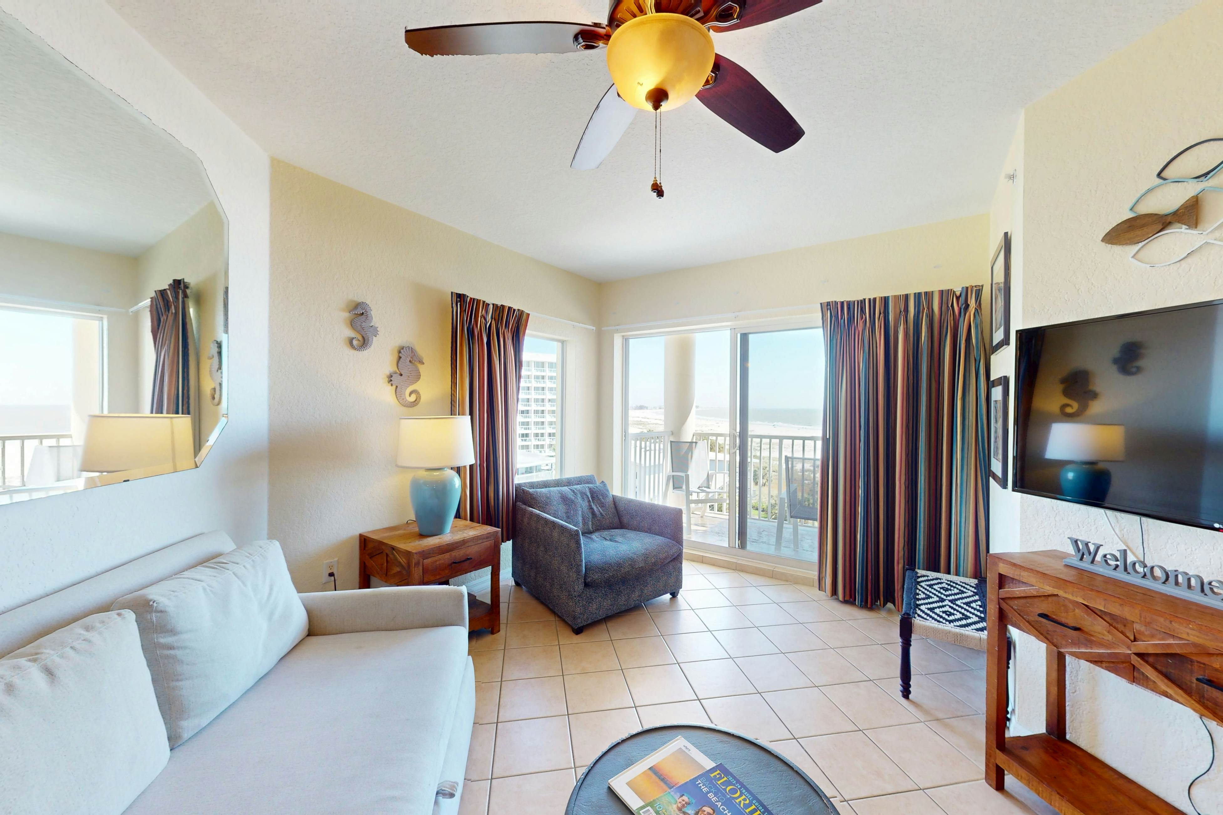 Beachfront and family friendly condo with two pools & hot tub- steps to the Gulf