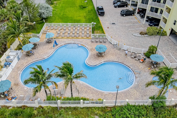 Beachfront and family friendly condo with two pools and hot tub steps to the Gulf
