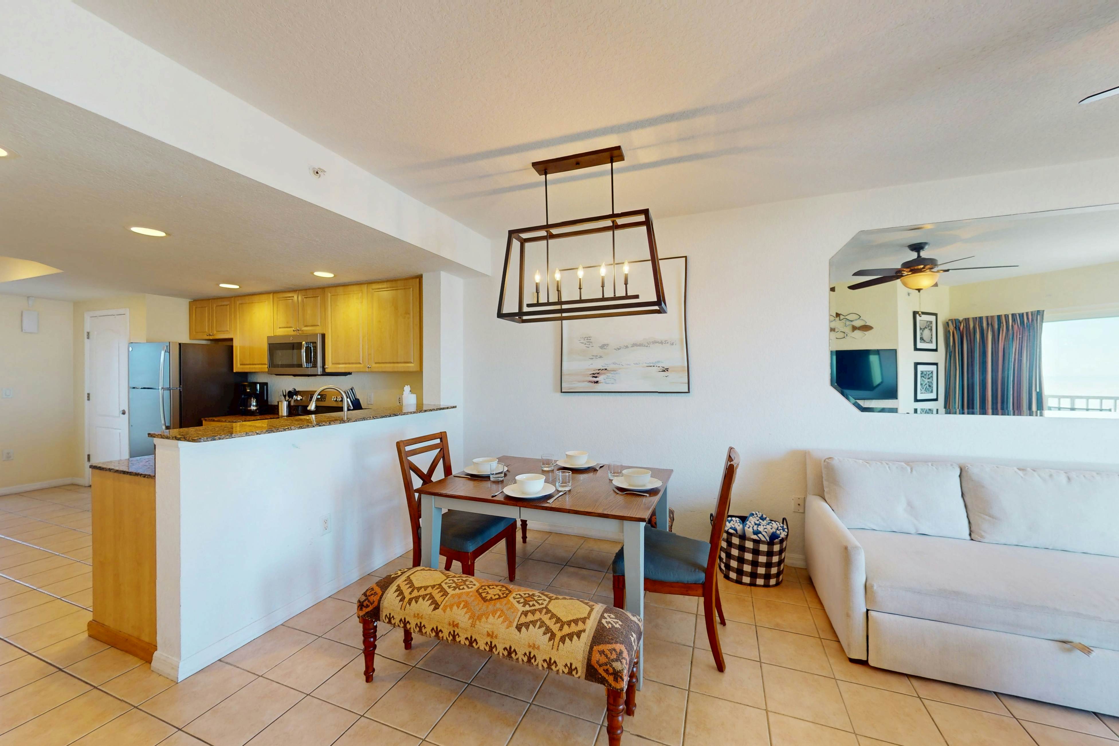 Beachfront and family friendly condo with two pools & hot tub- steps to the Gulf