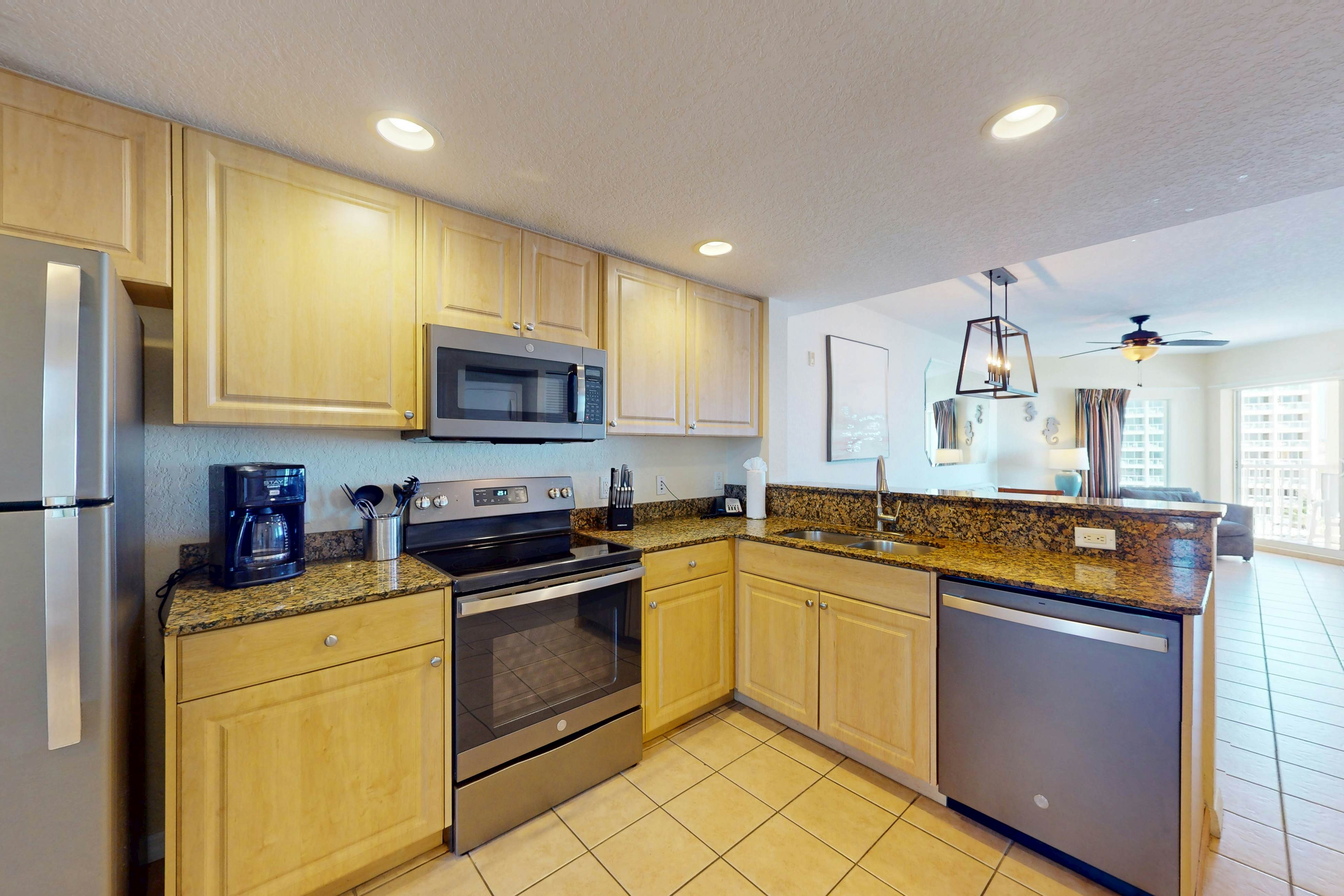 Beachfront and family friendly condo with two pools & hot tub- steps to the Gulf