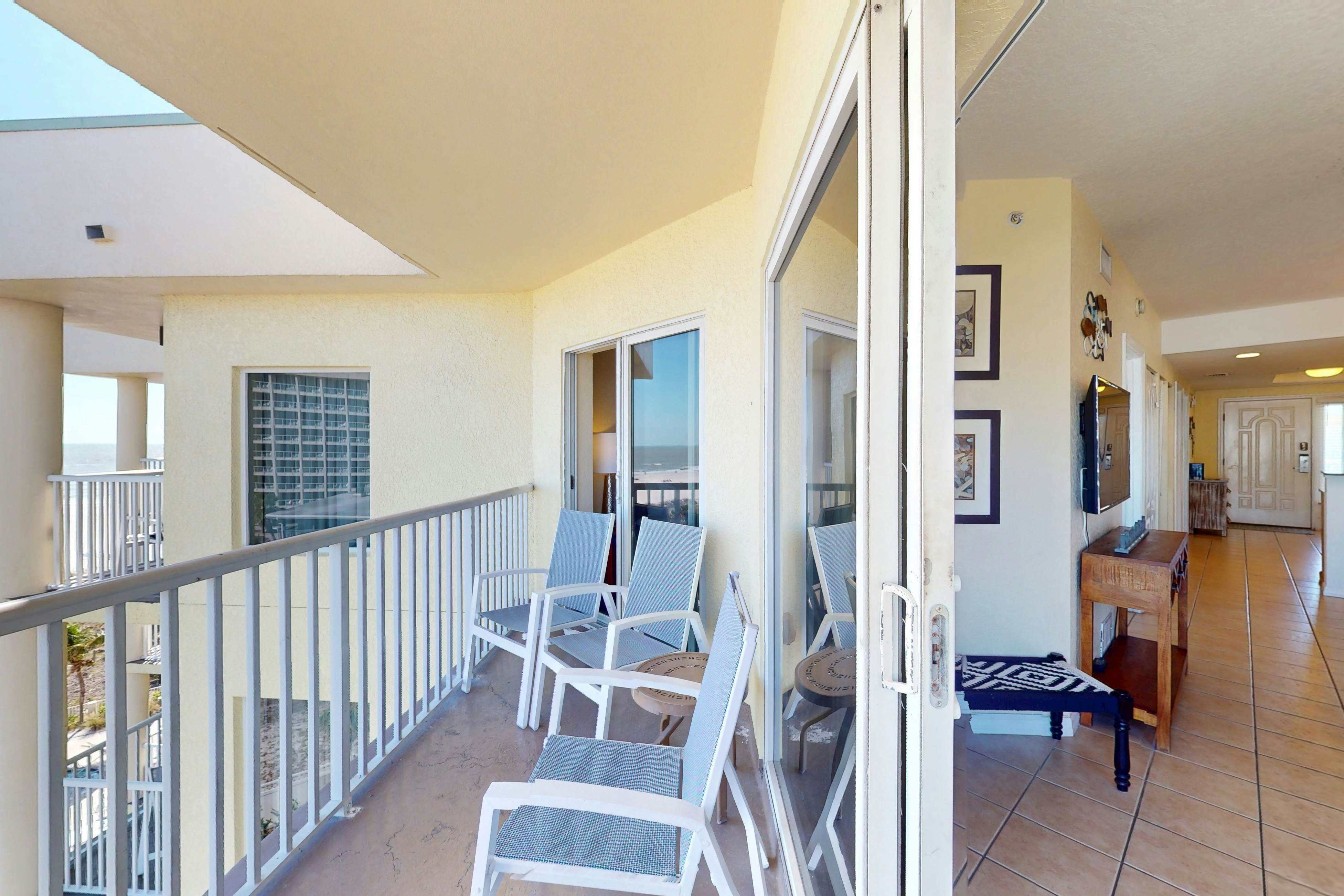Beachfront and family friendly condo with two pools & hot tub- steps to the Gulf