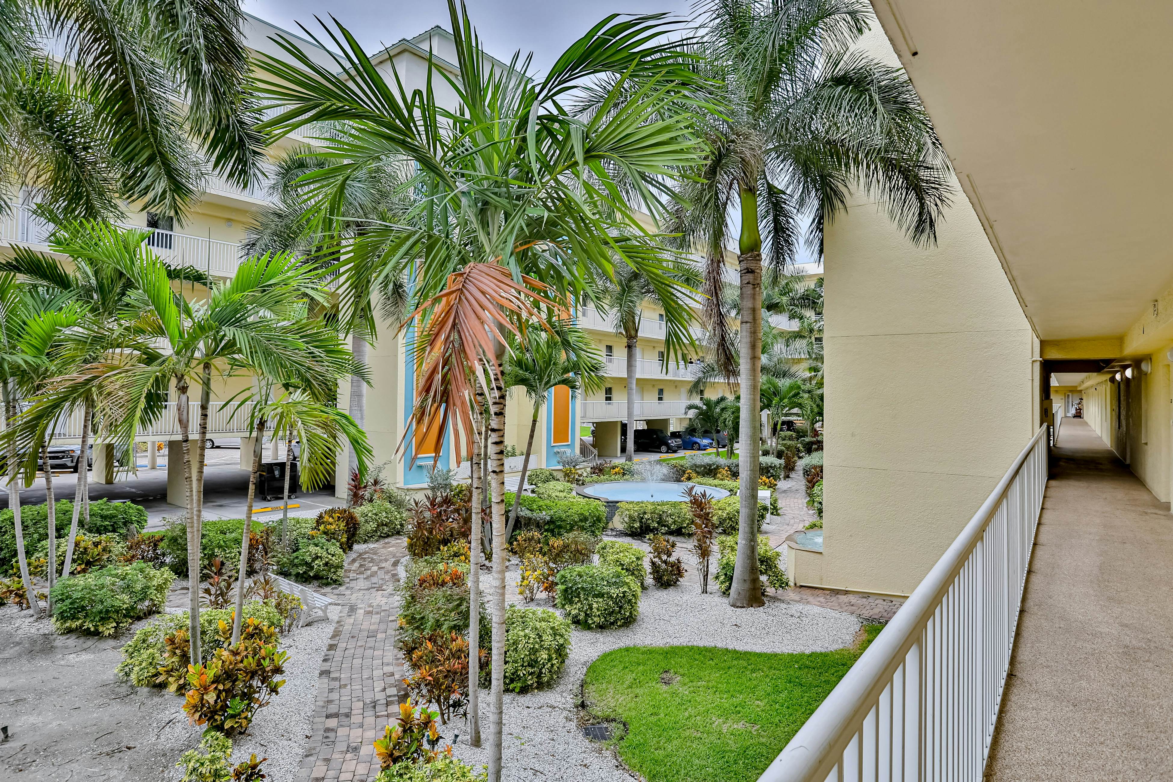 Beachfront and family friendly condo with two pools & hot tub- steps to the Gulf