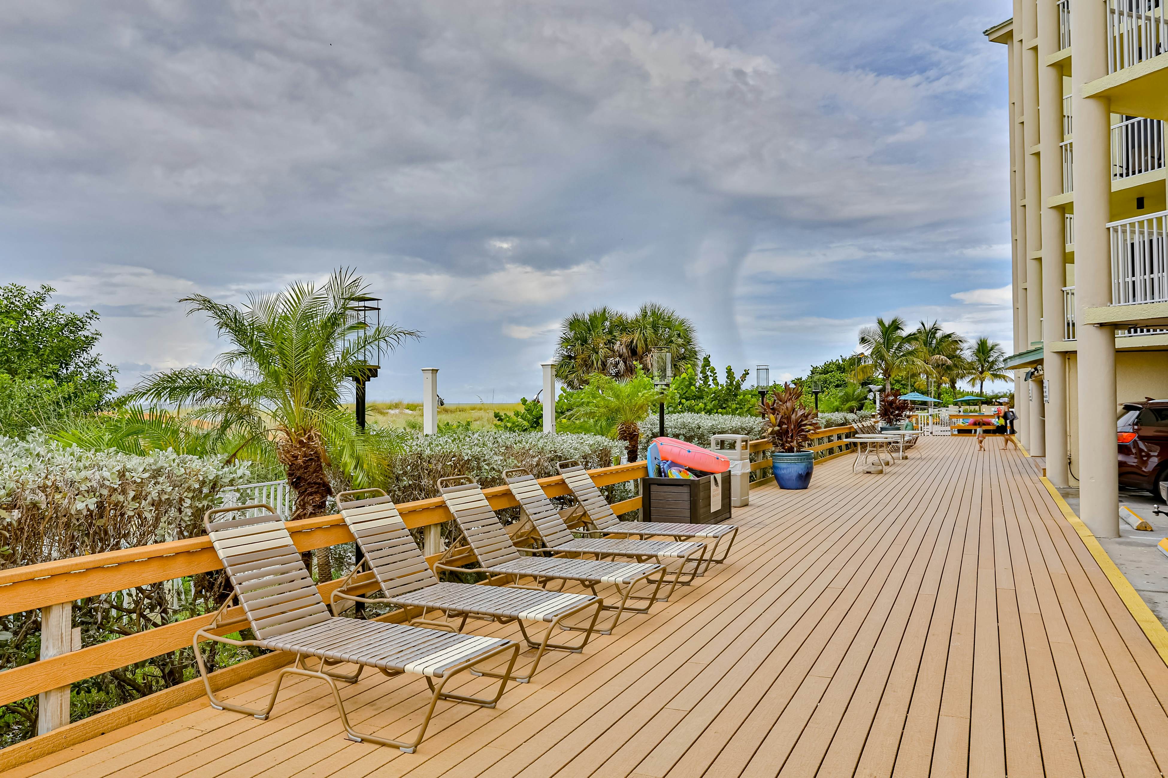 Beachfront and family friendly condo with two pools & hot tub- steps to the Gulf