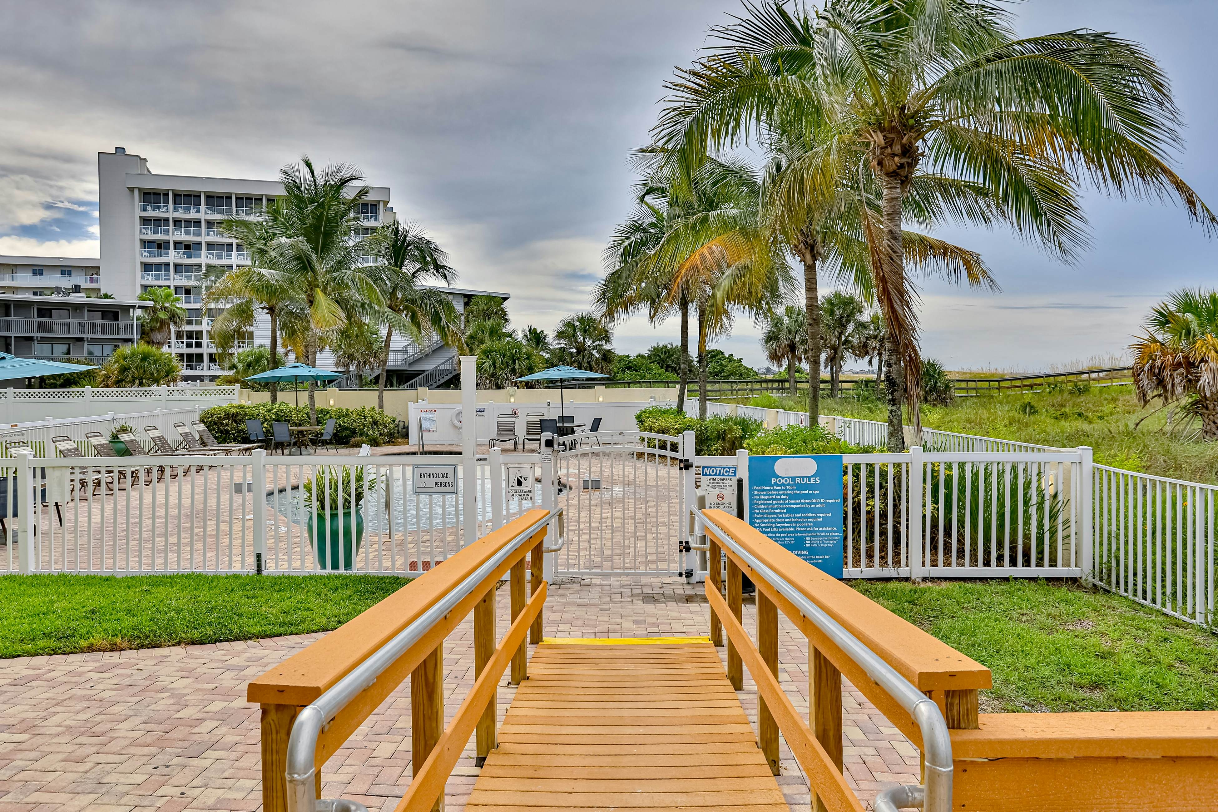 Beachfront and family friendly condo with two pools & hot tub- steps to the Gulf