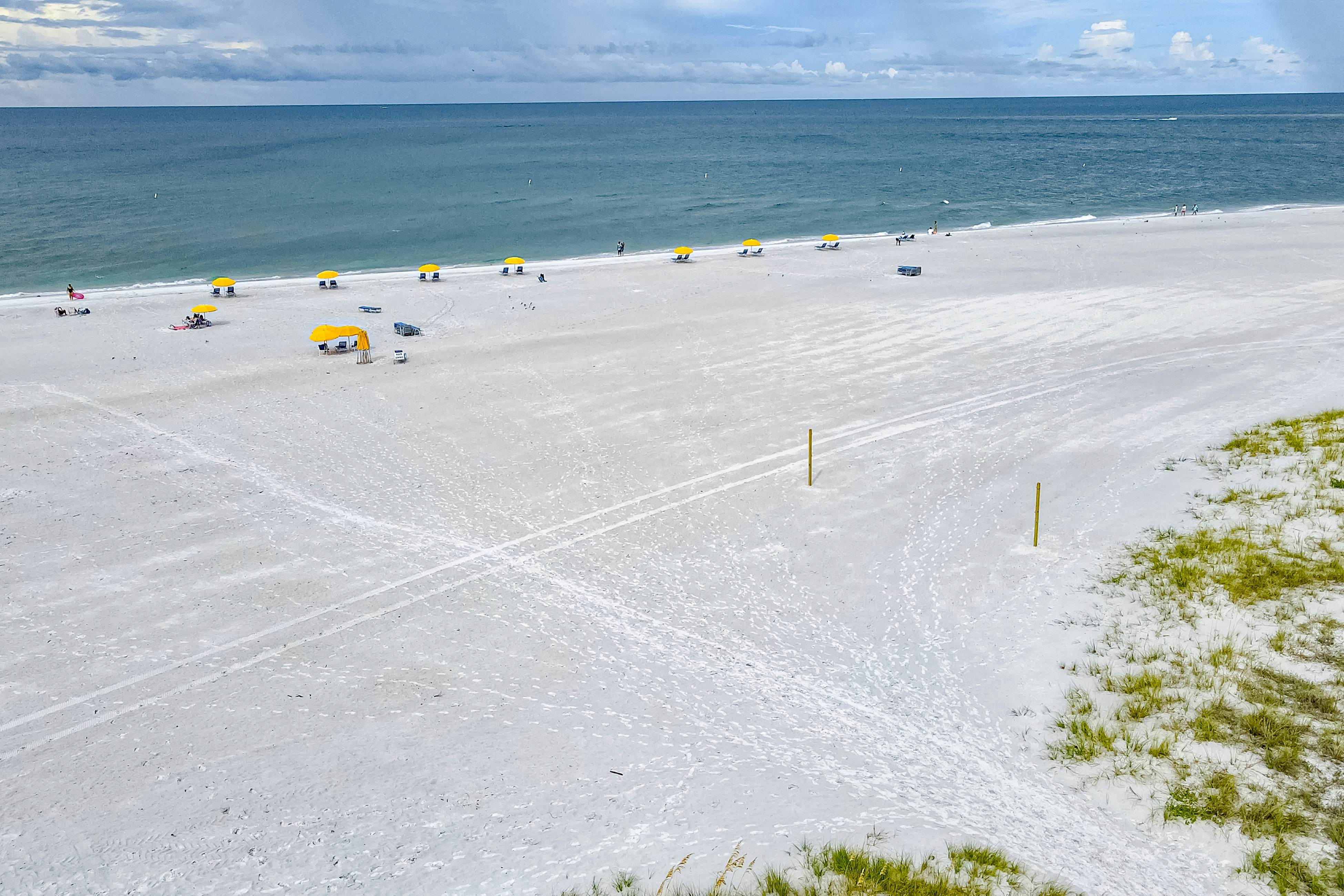 Beachfront and family friendly condo with two pools & hot tub- steps to the Gulf