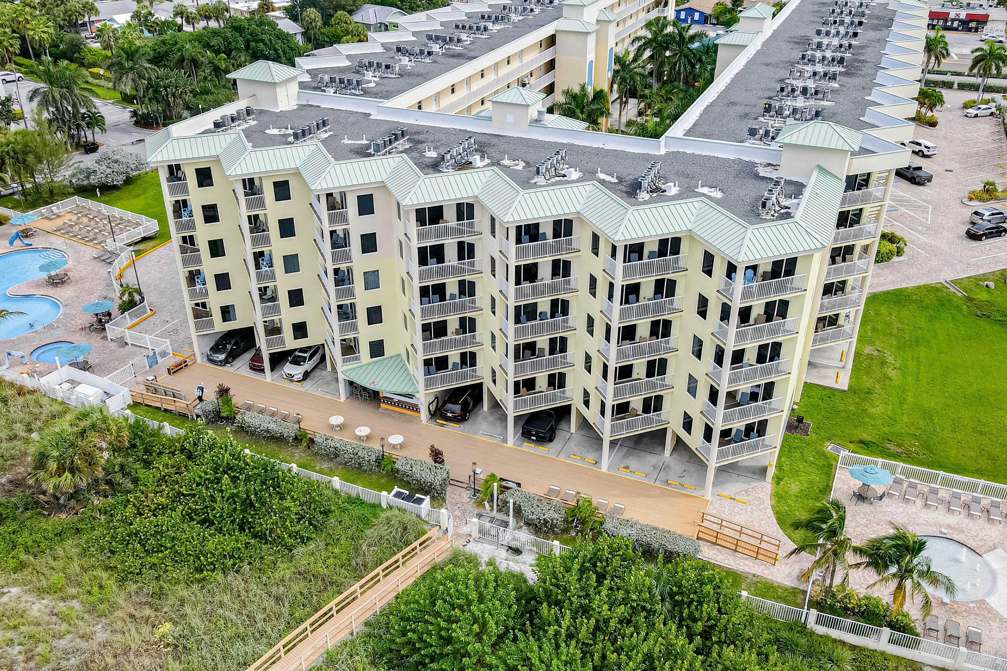 Beachfront and family friendly condo with two pools & hot tub- steps to the Gulf