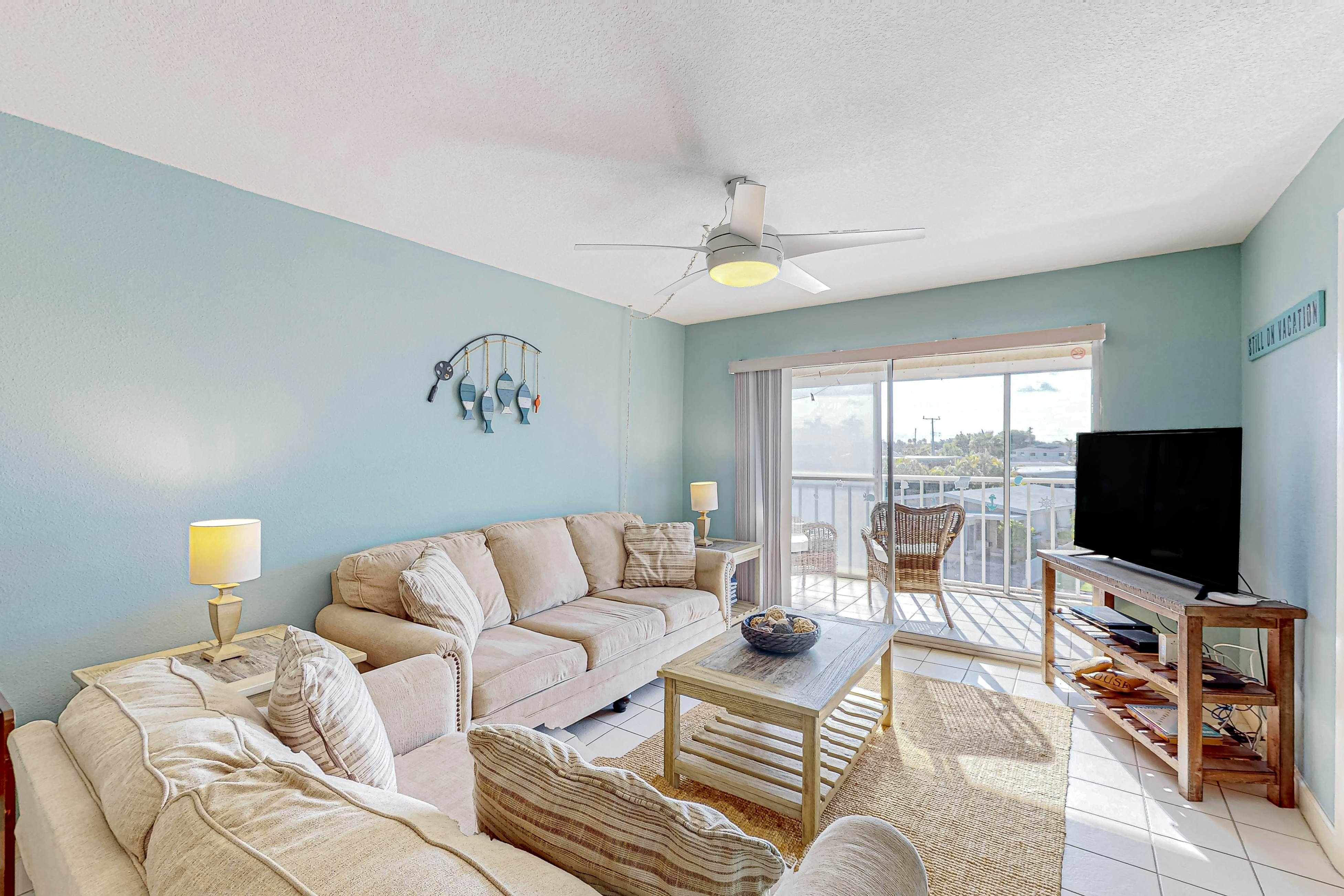 Canal front home near the beach with outdoor pool balcony water views and WD