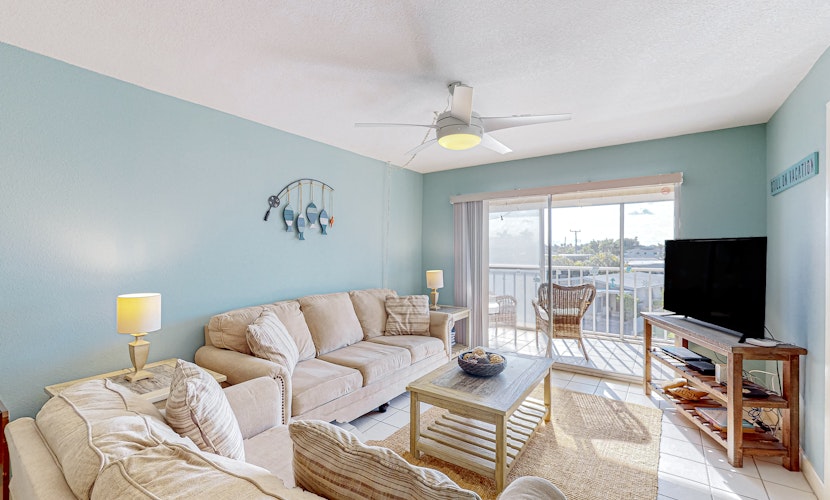 Canal front home near the beach with outdoor pool balcony water views and WD