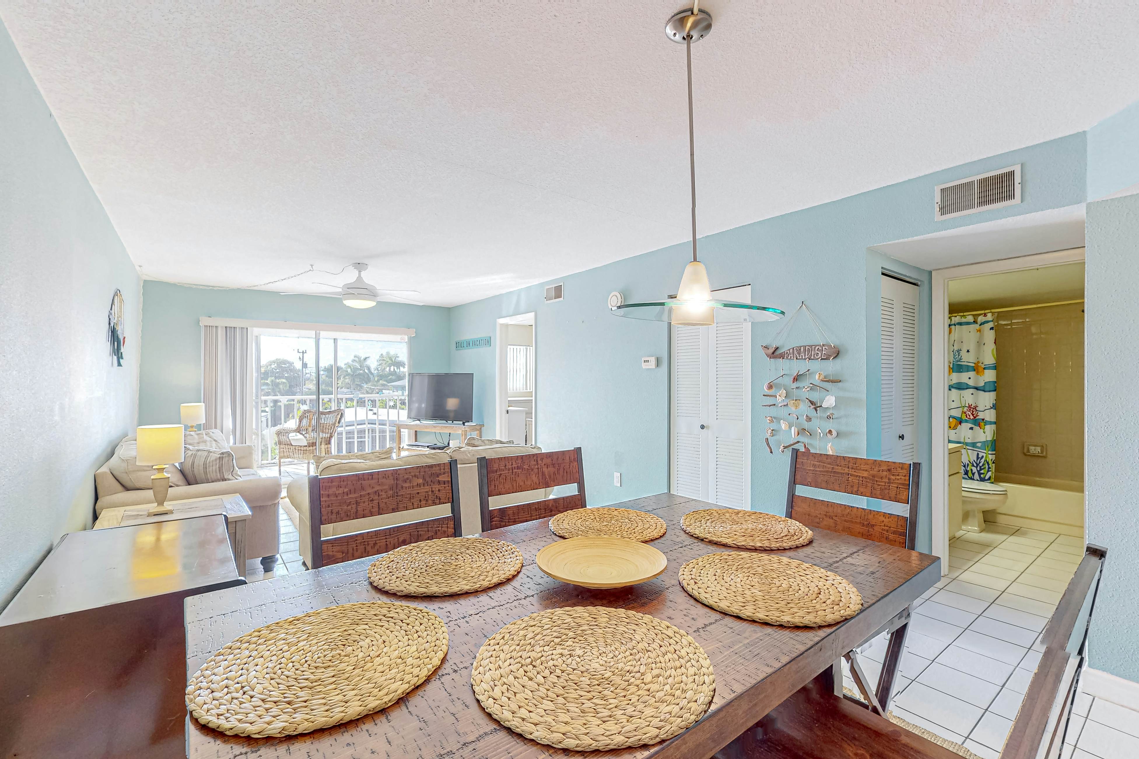 Canal front home near the beach with outdoor pool balcony water views and WD