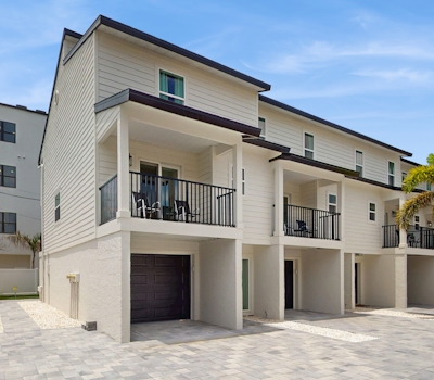 Family and dog friendly steps to the Gulf and beaches shared putting green AC