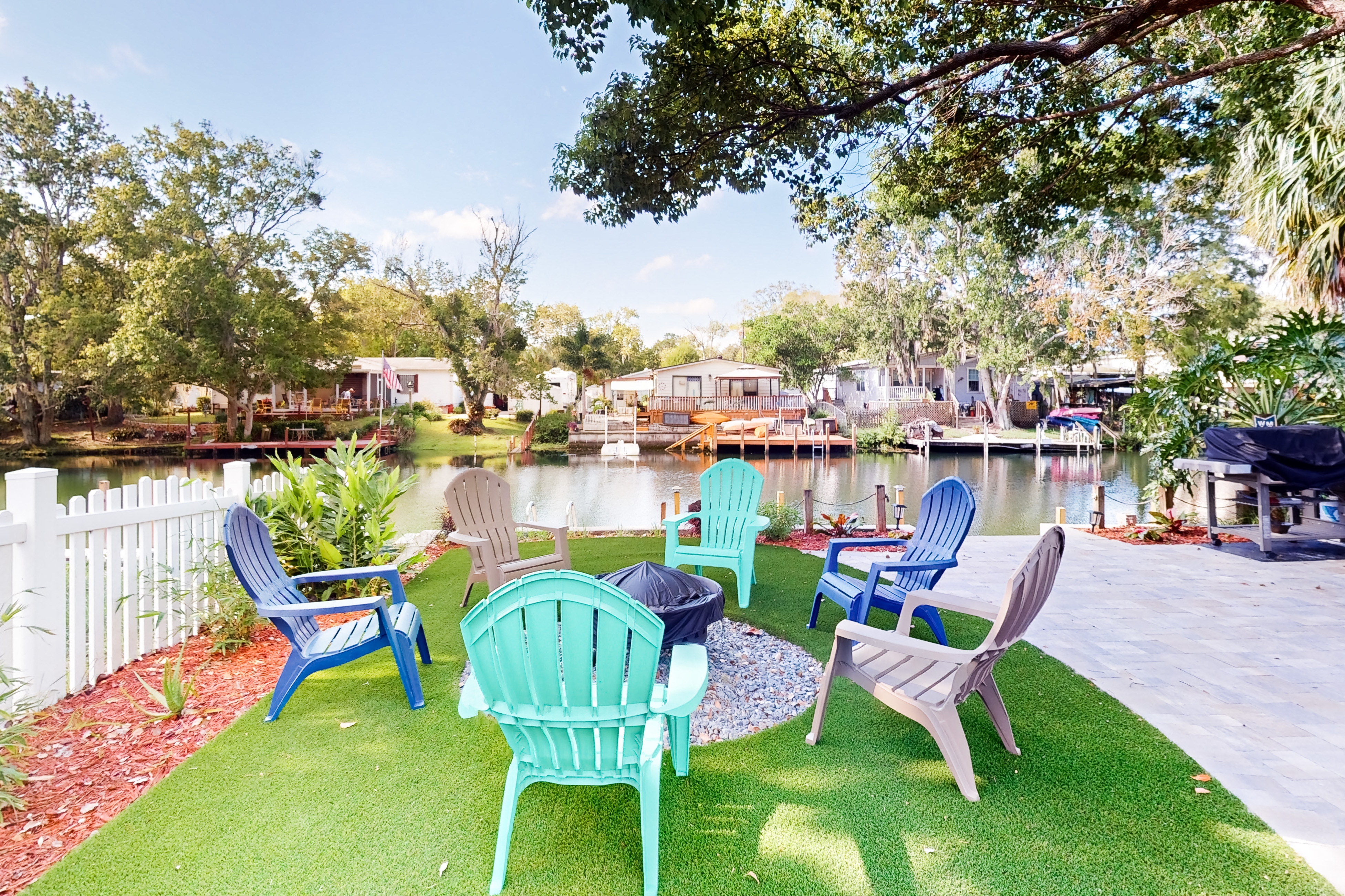 Waterfront home with amazing yard firepit grill putting green AC and WD