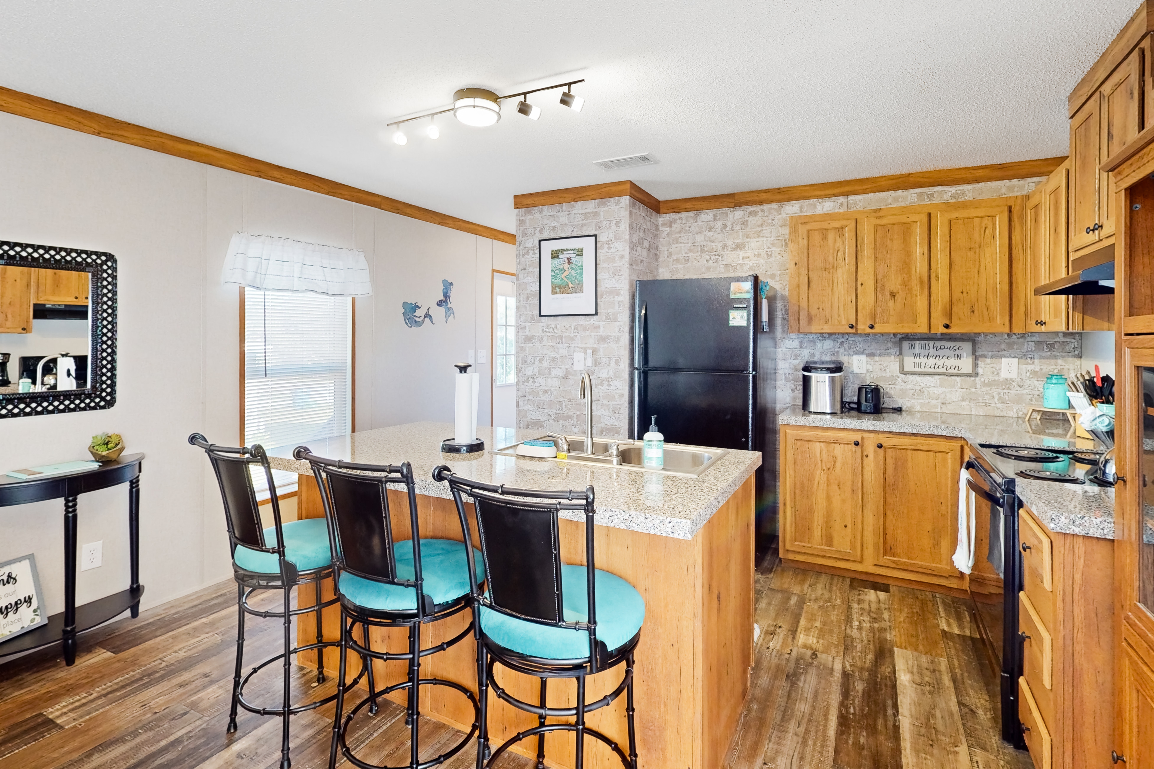 Waterfront home with amazing yard firepit grill putting green AC and WD