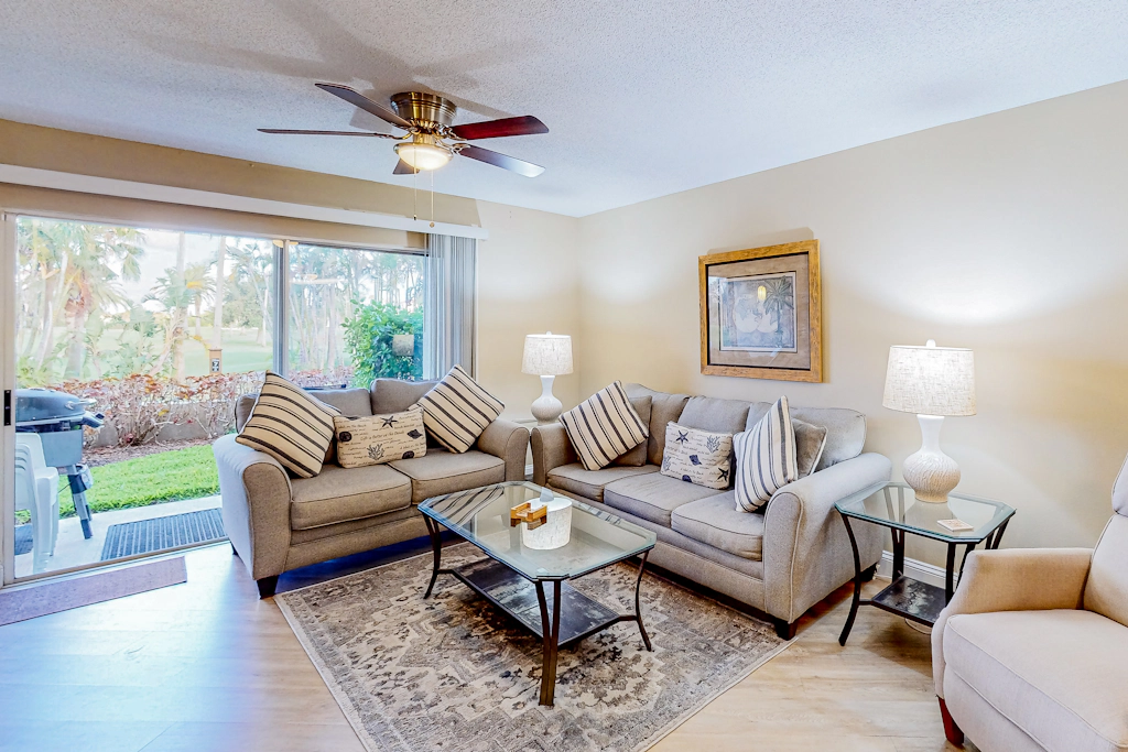 Ground floor condo with golf course views pool and beach access