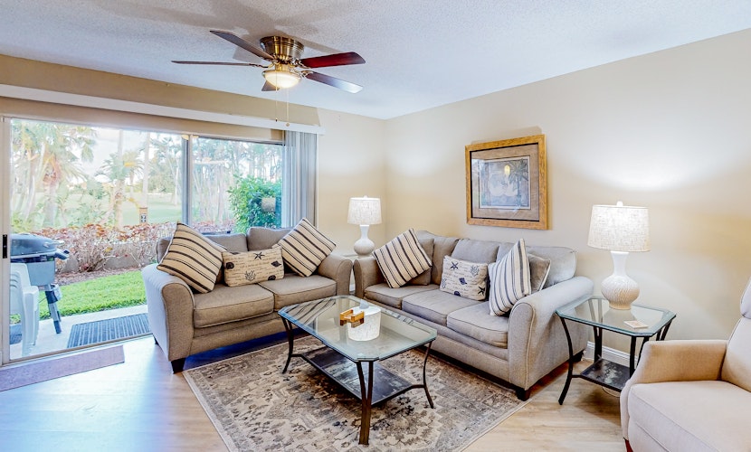 Ground floor condo with golf course views pool and beach access