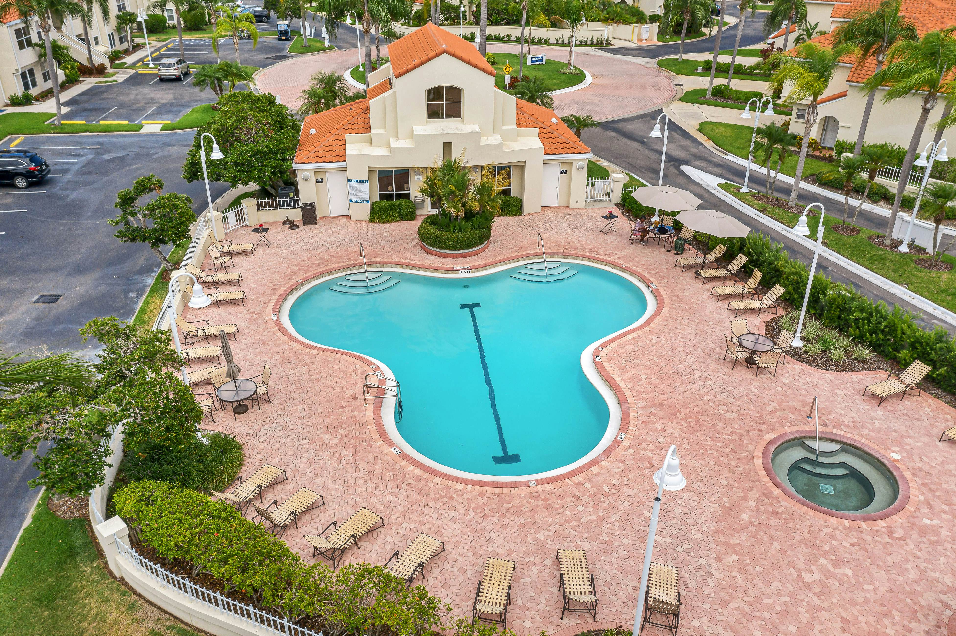 Ground-floor condo with golf course views, pool & beach access