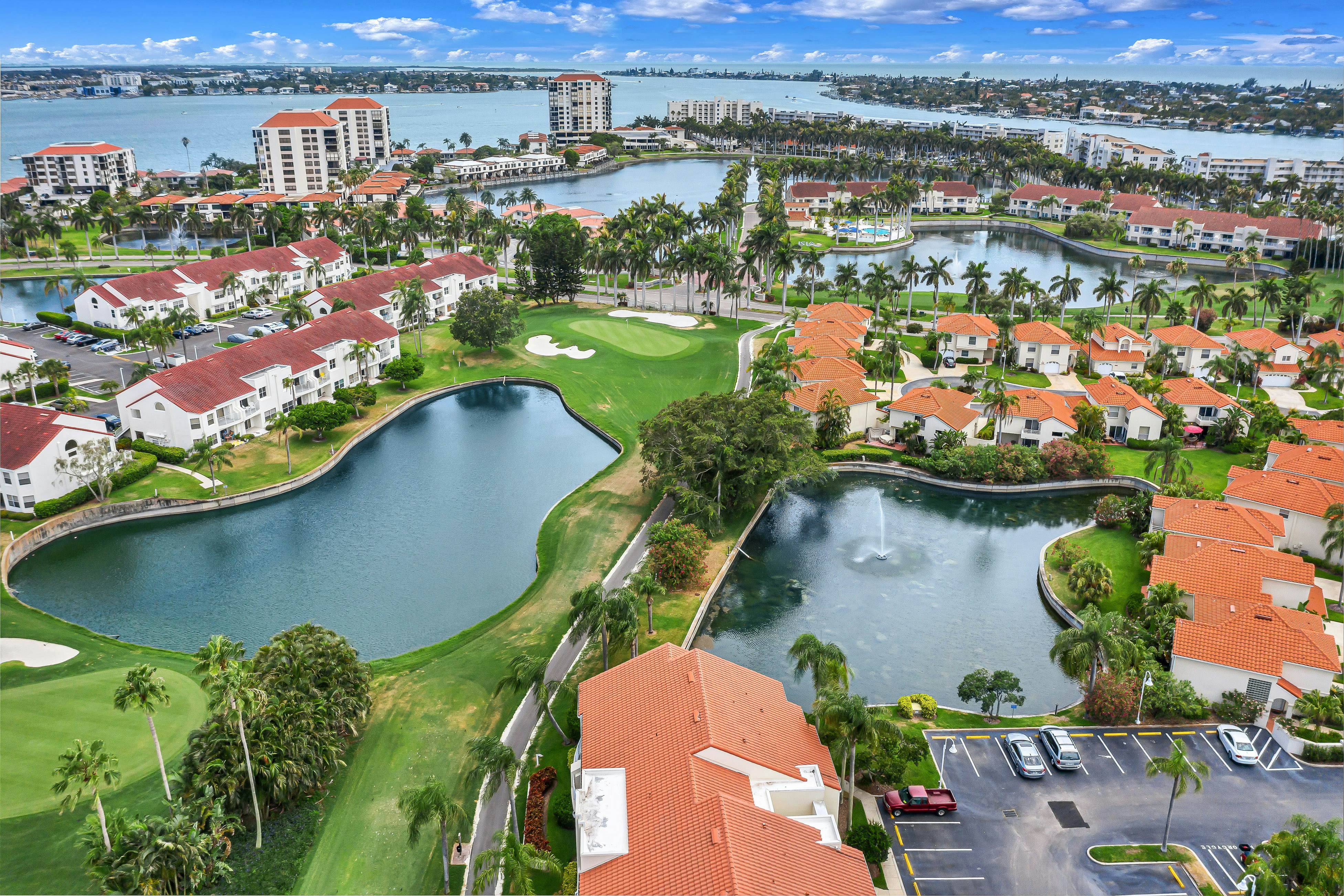 Ground-floor condo with golf course views, pool & beach access