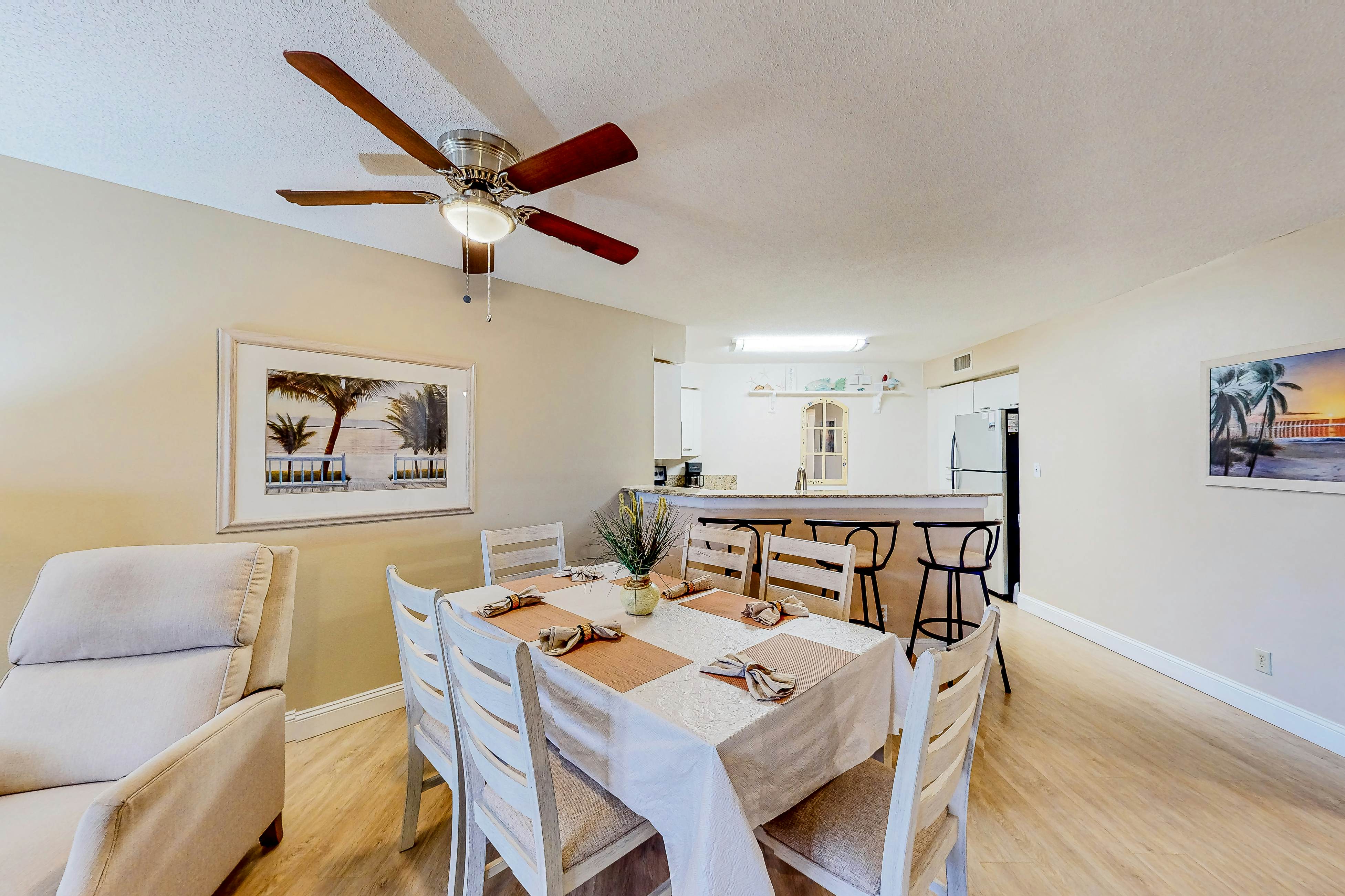 Ground-floor condo with golf course views, pool & beach access