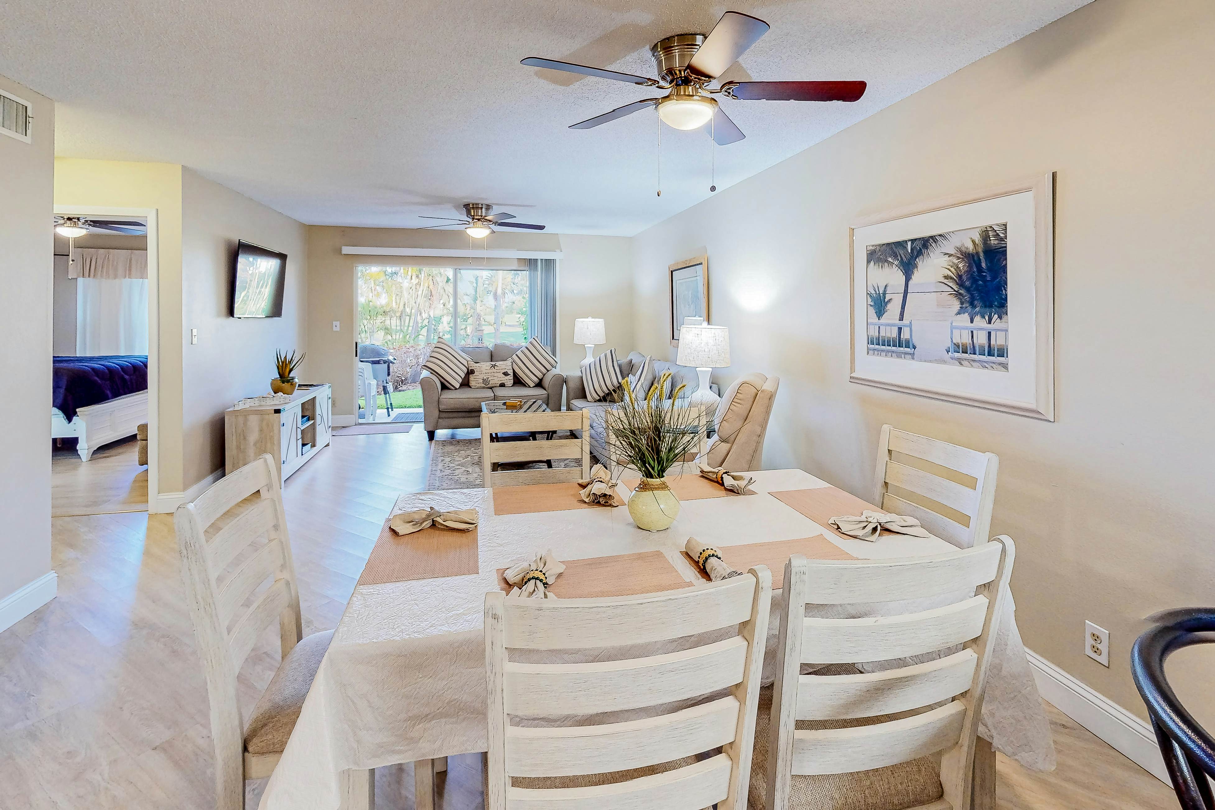 Ground-floor condo with golf course views, pool & beach access