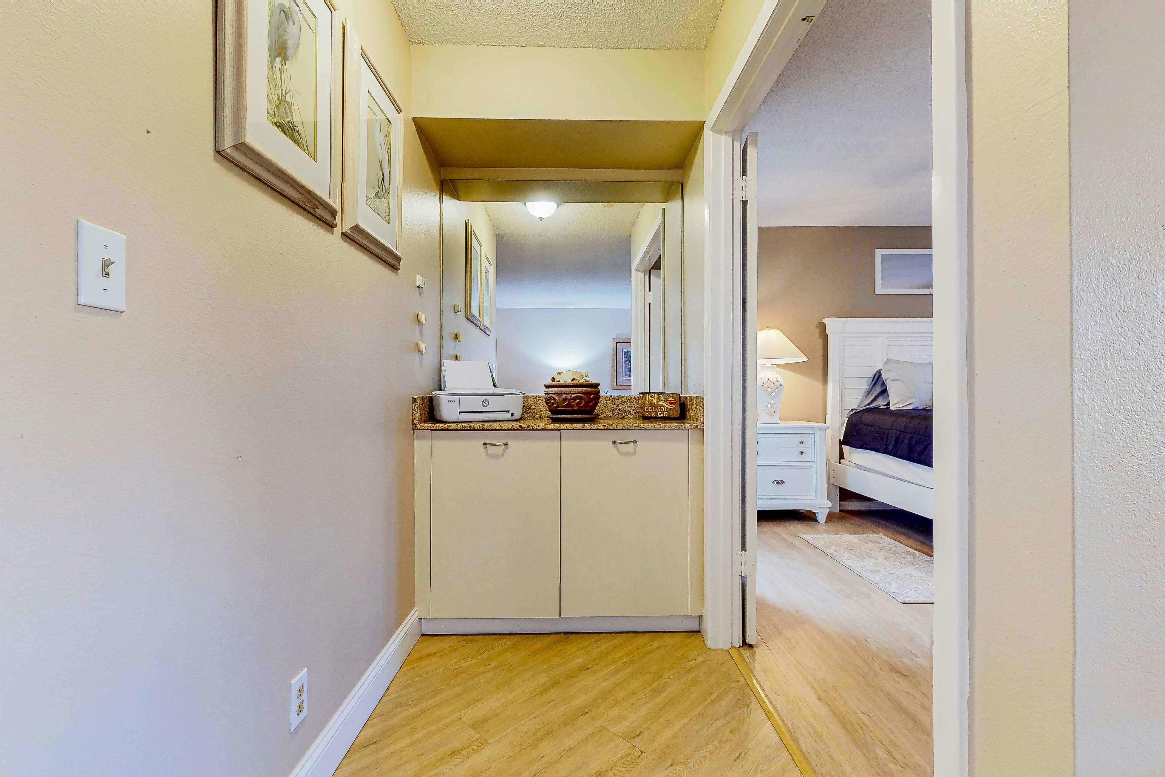 Ground-floor condo with golf course views, pool & beach access