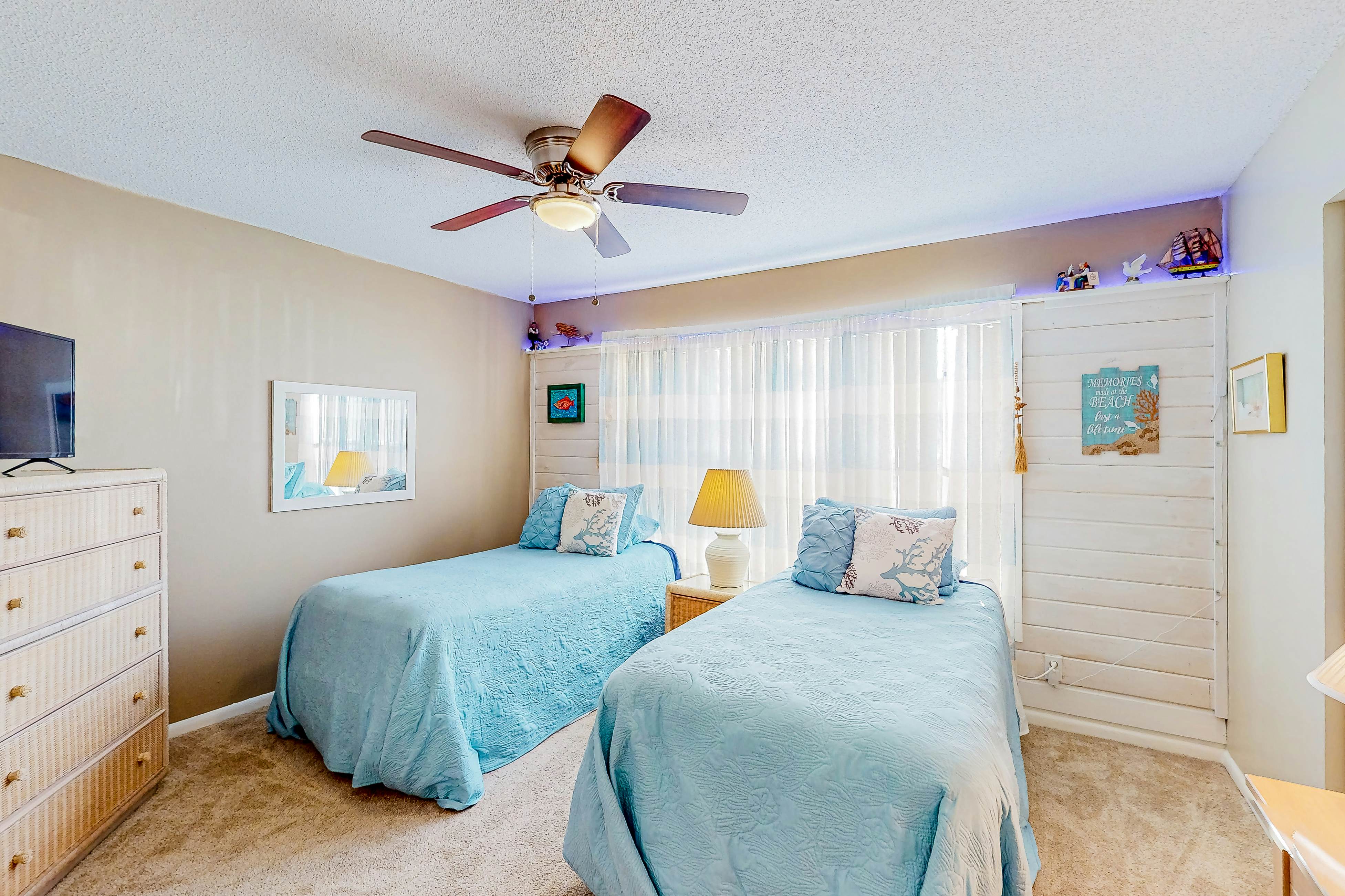 Ground-floor condo with golf course views, pool & beach access