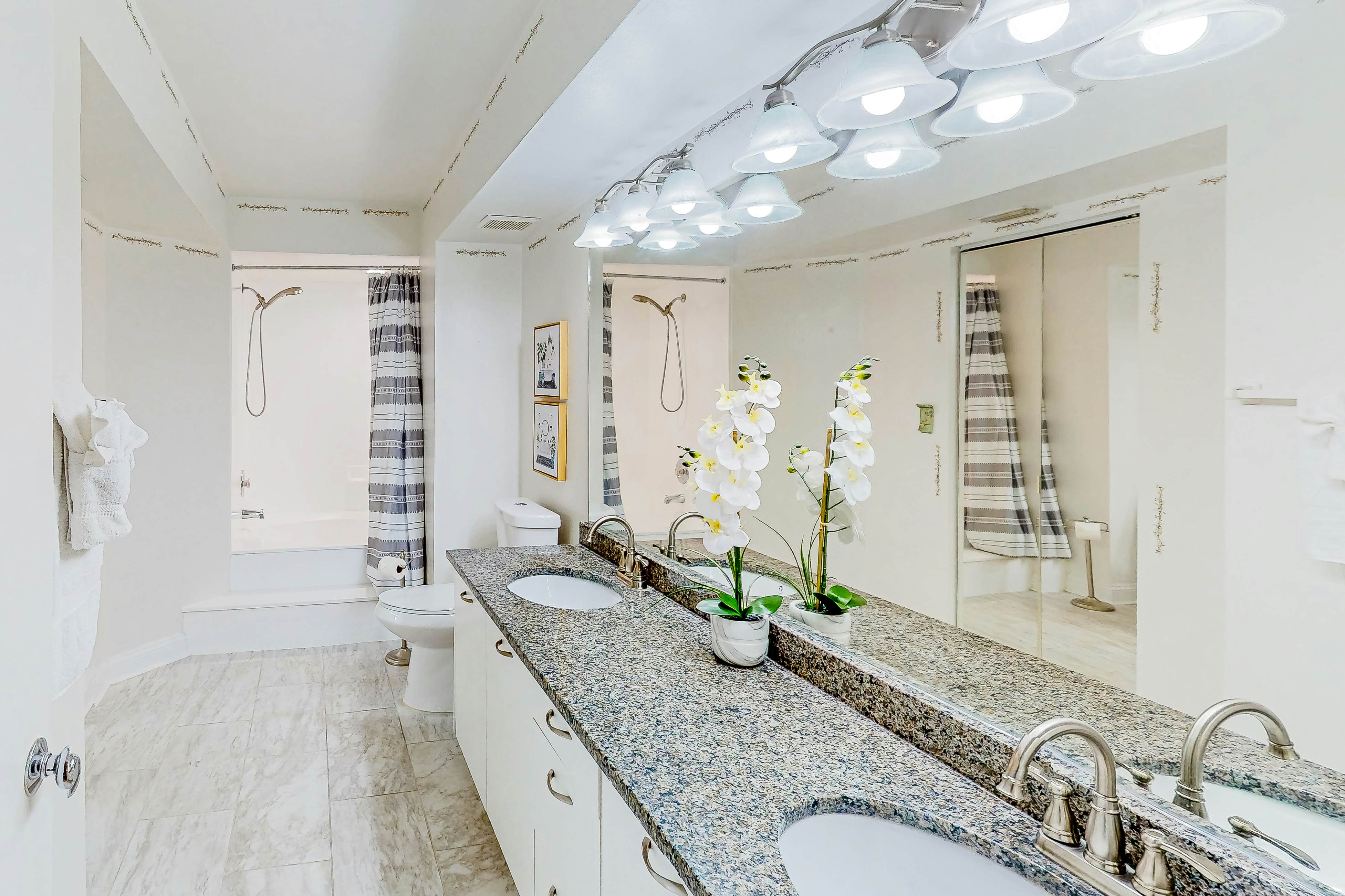 Ground-floor condo with golf course views, pool & beach access