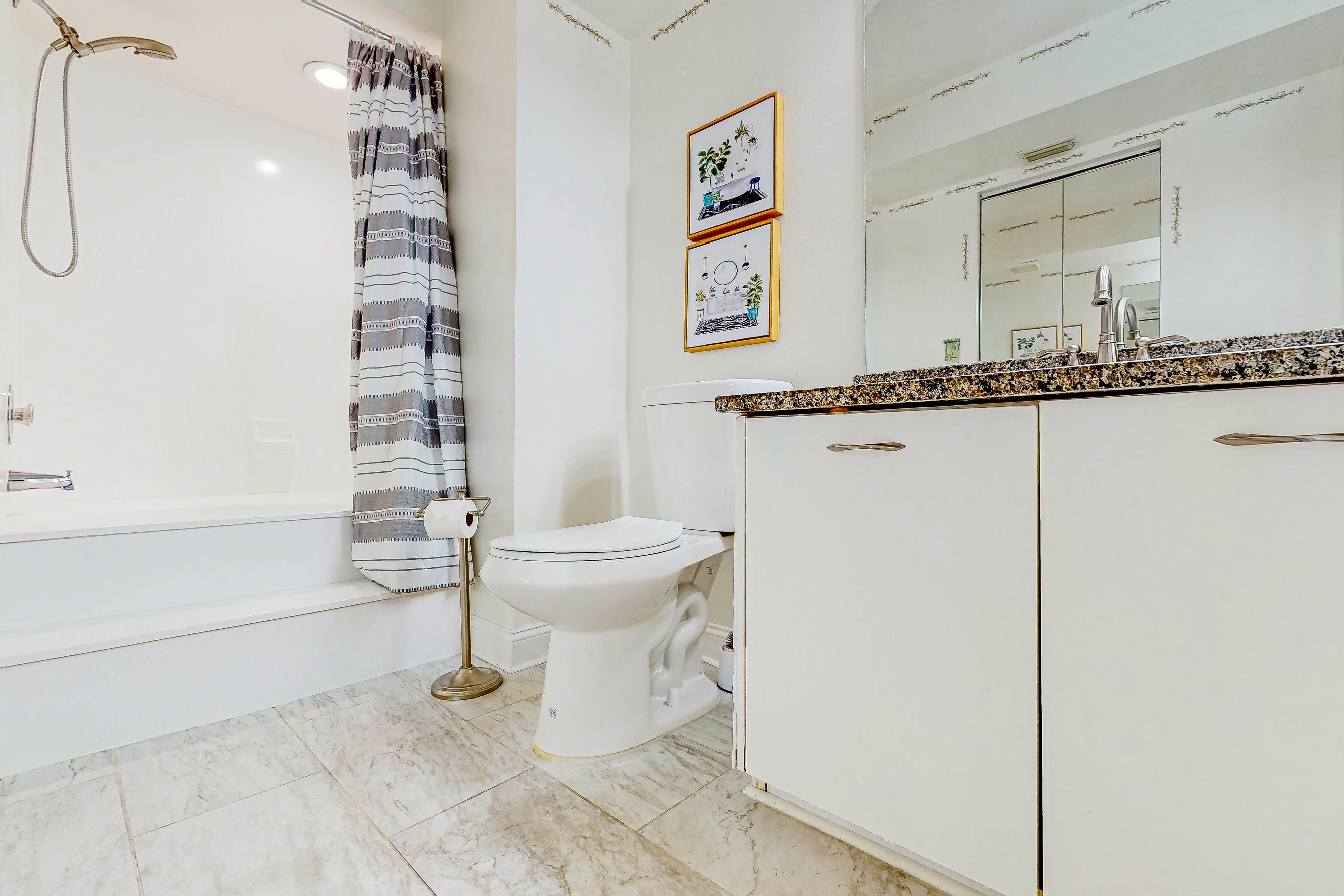 Ground-floor condo with golf course views, pool & beach access