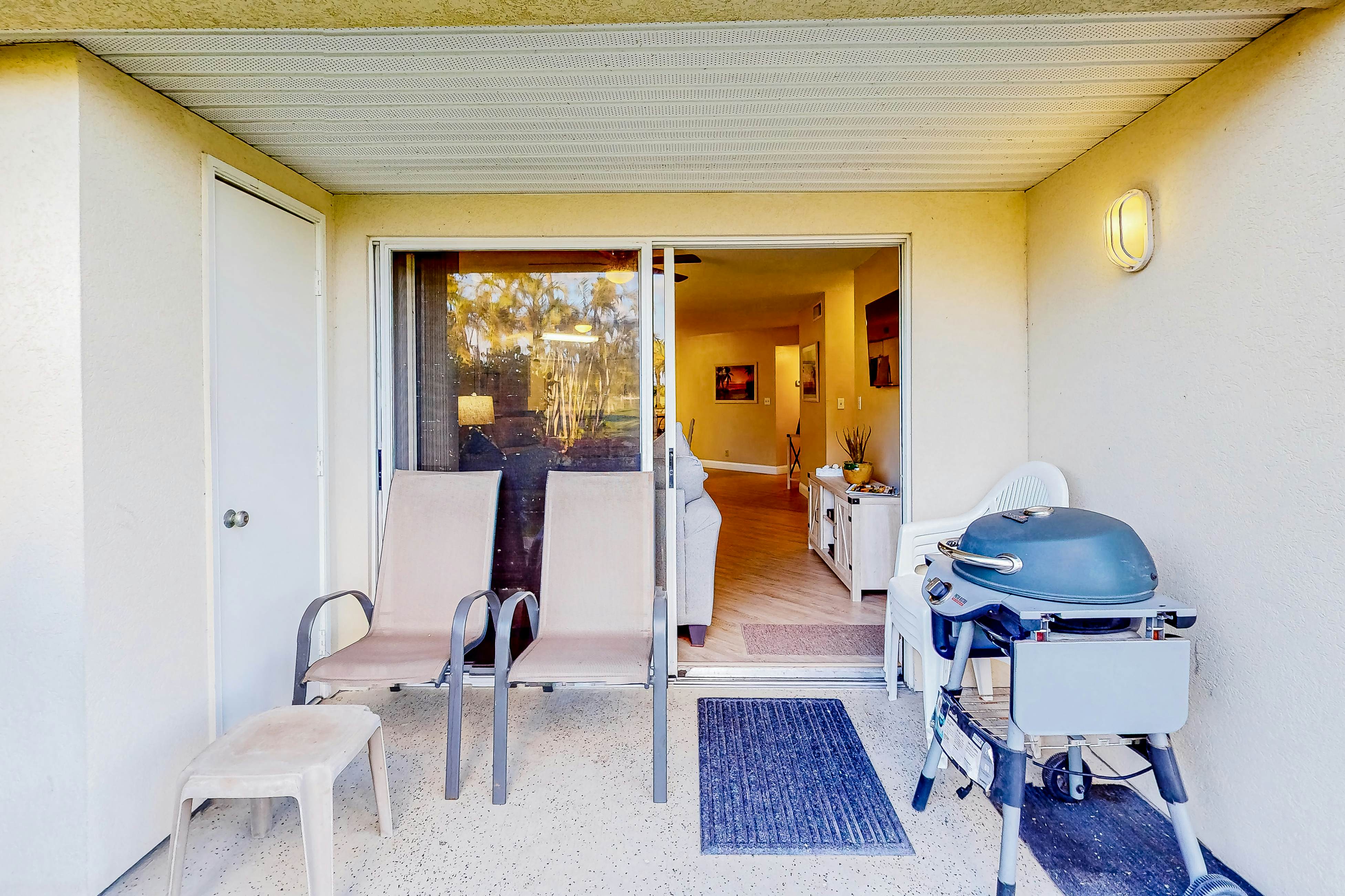 Ground-floor condo with golf course views, pool & beach access