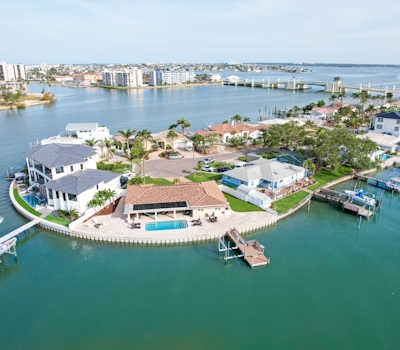 Chic waterfront retreat with private pool and outdoor kitchen near the beach