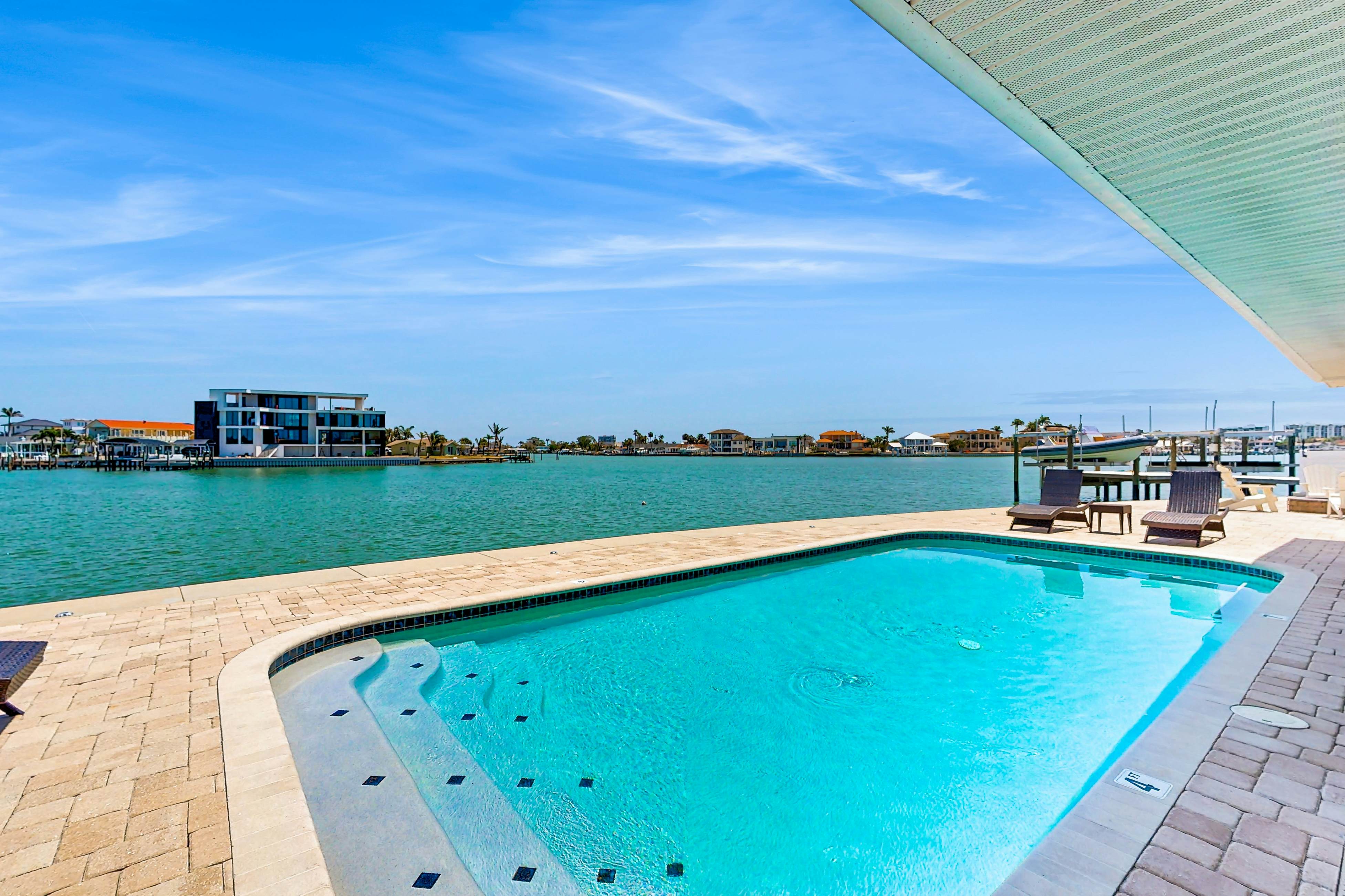 Chic waterfront retreat with private pool & outdoor kitchen - near the beach