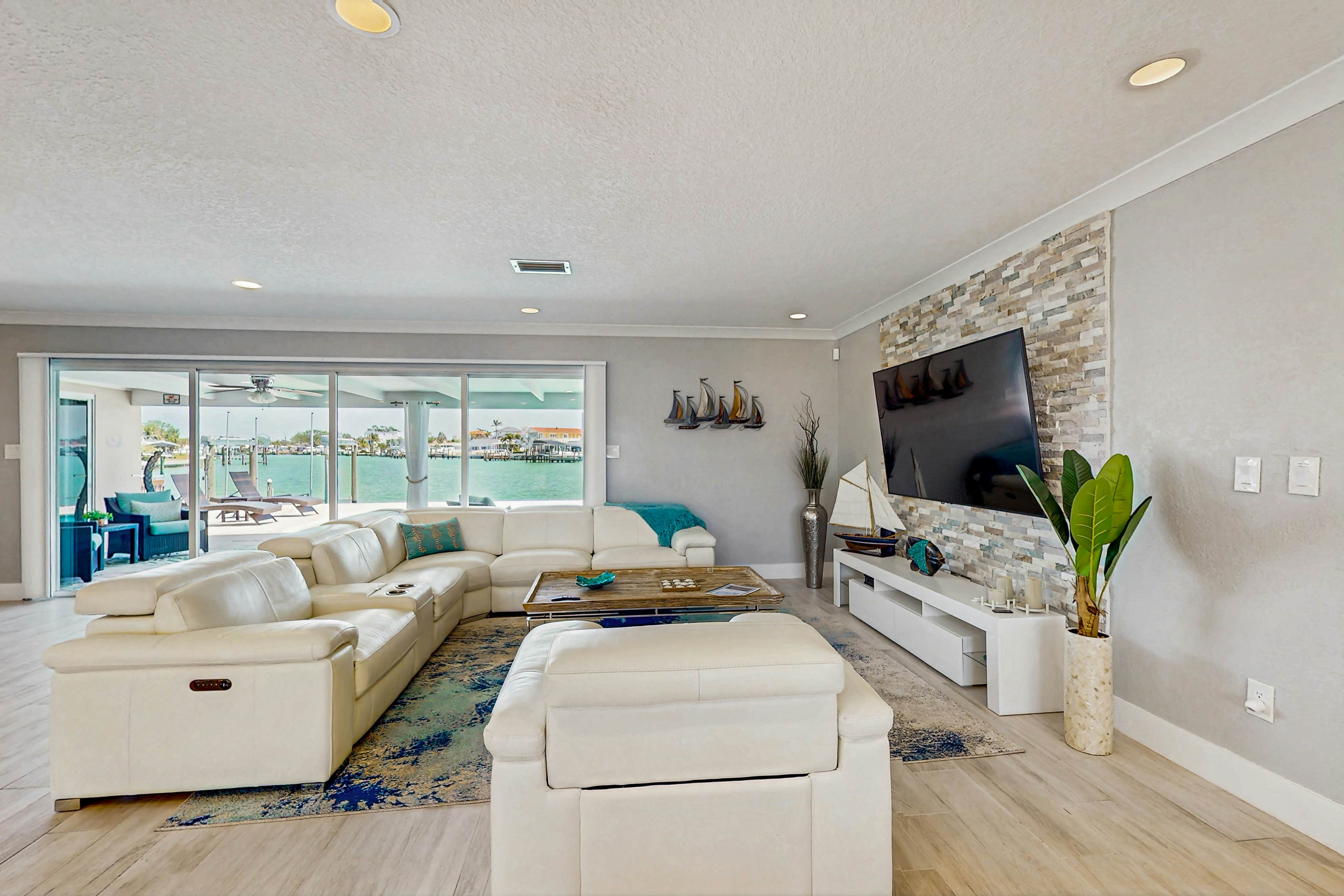 Chic waterfront retreat with private pool & outdoor kitchen - near the beach