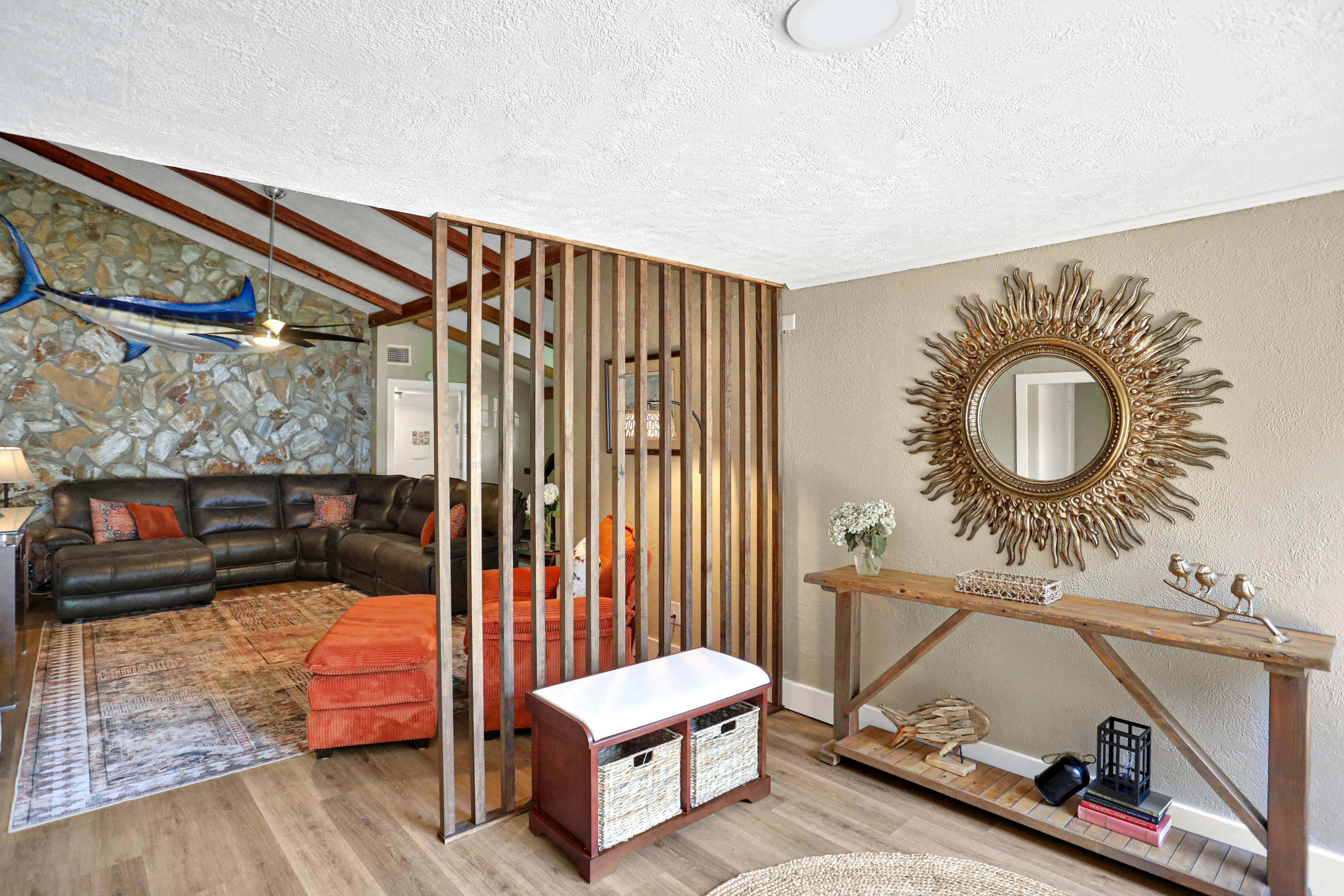 Riverfront retreat with pool/spa, outdoor kitchen, firepit, dock, sauna & games