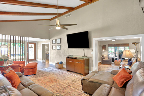 Riverfront retreat with pool spa outdoor kitchen firepit dock sauna and games