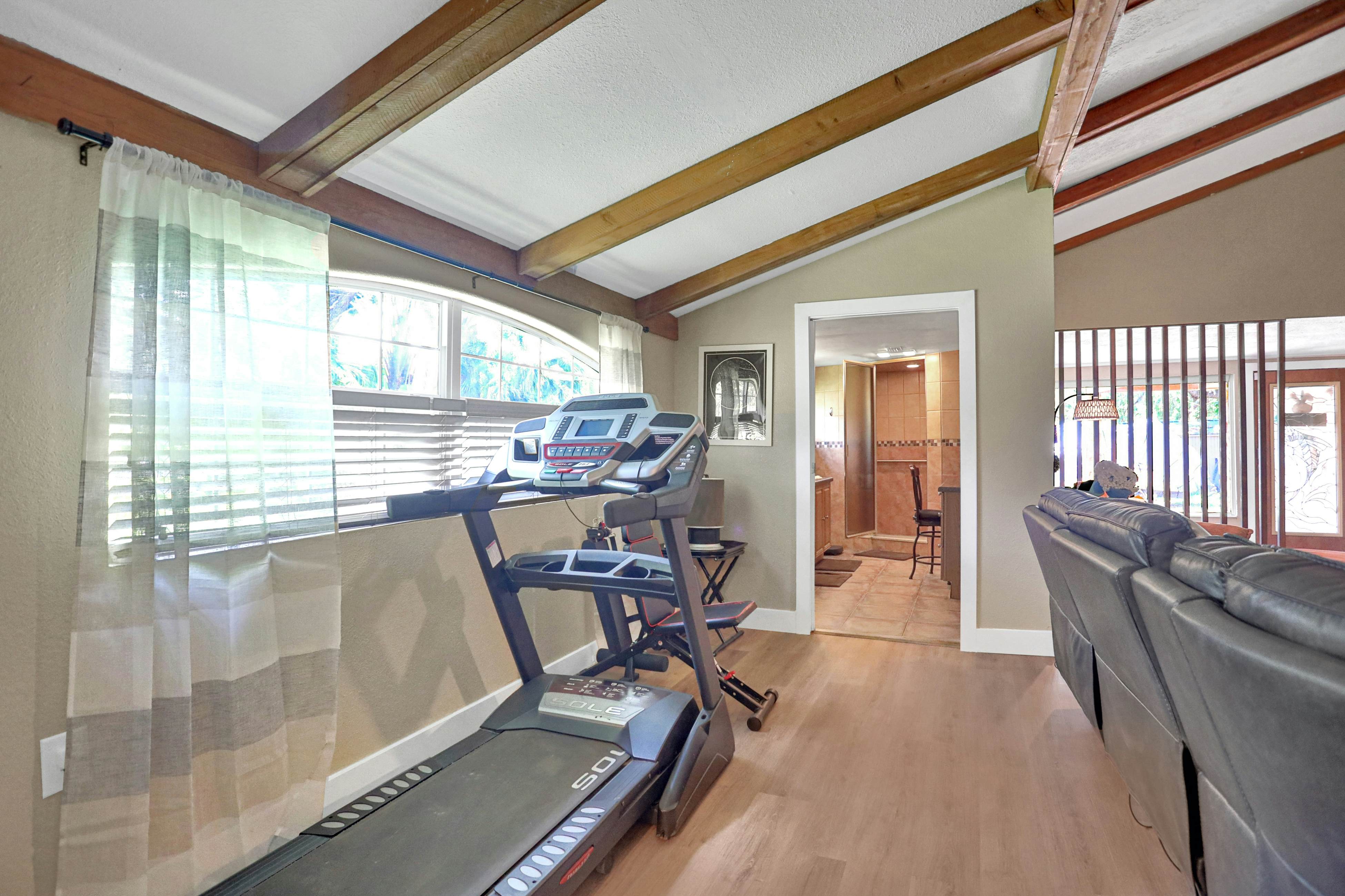 Riverfront retreat with pool/spa, outdoor kitchen, firepit, dock, sauna & games