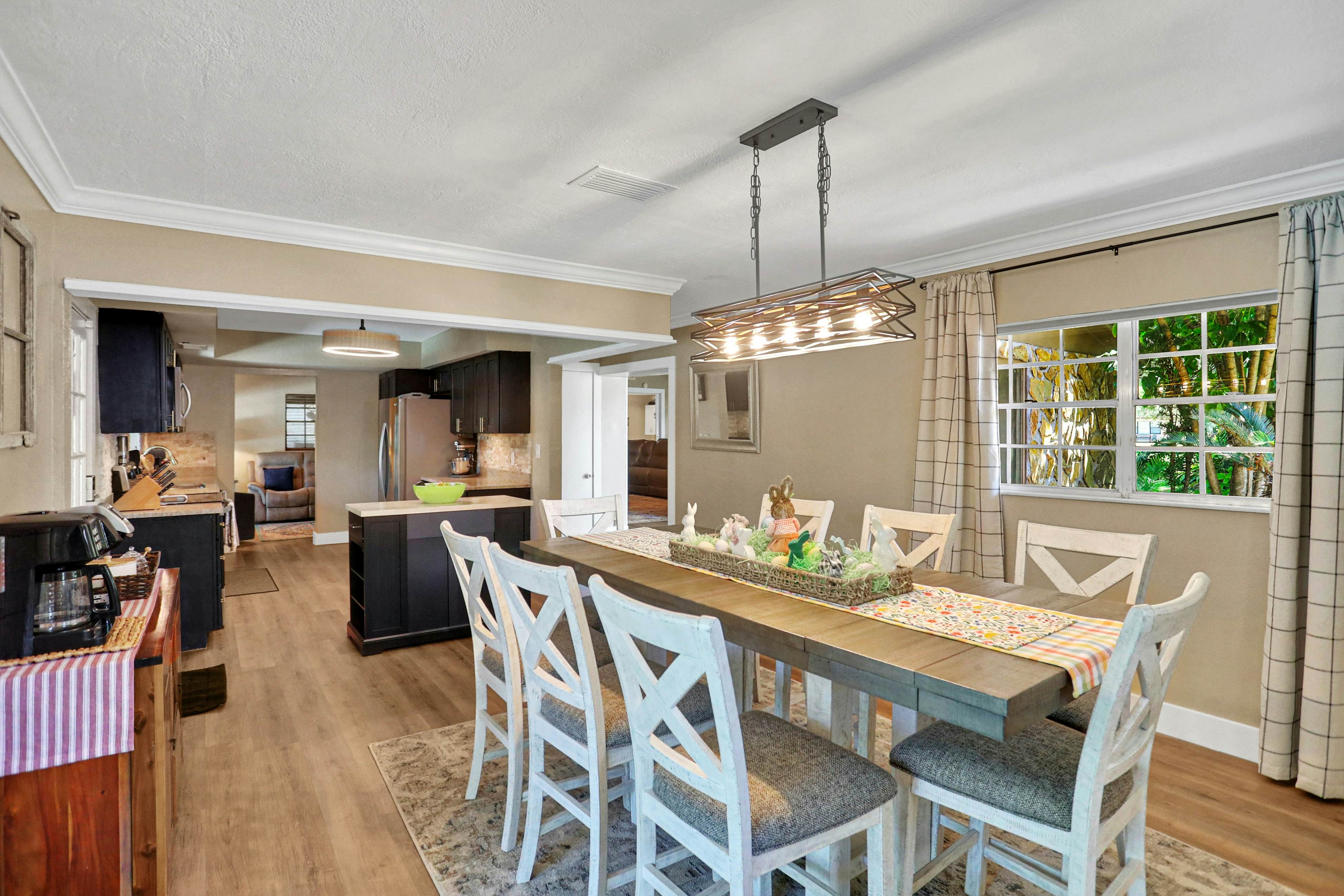 Riverfront retreat with pool/spa, outdoor kitchen, firepit, dock, sauna & games