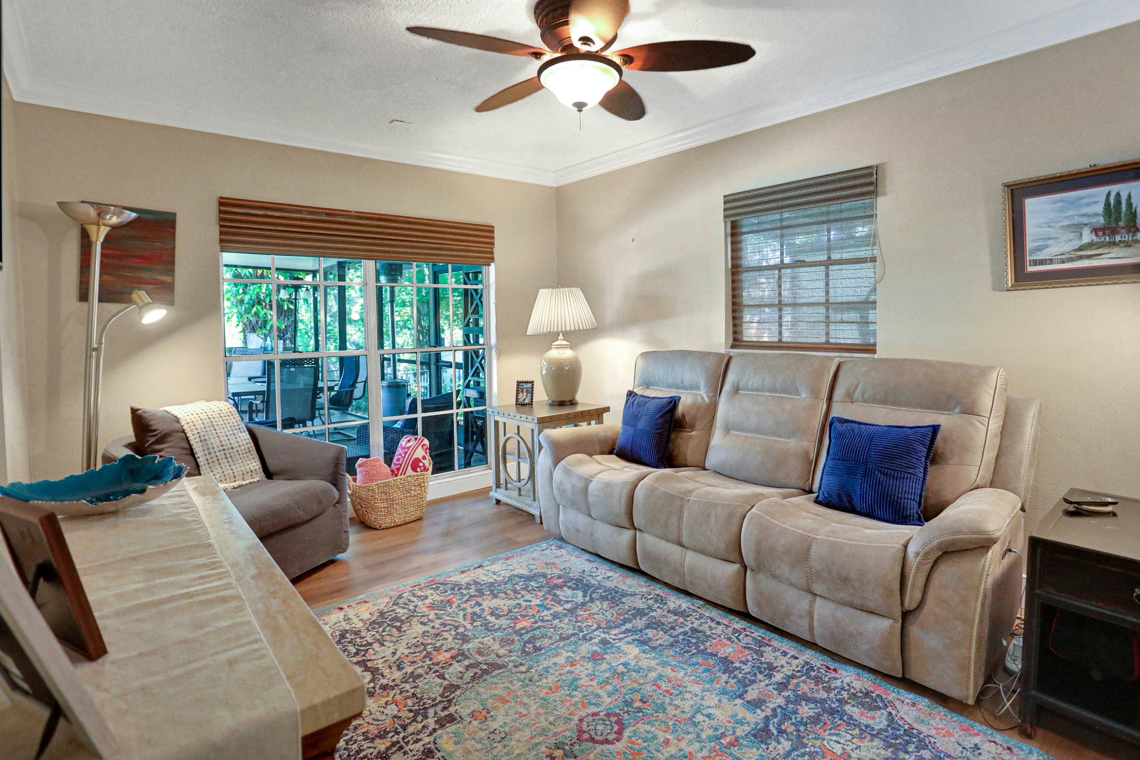 Riverfront retreat with pool/spa, outdoor kitchen, firepit, dock, sauna & games