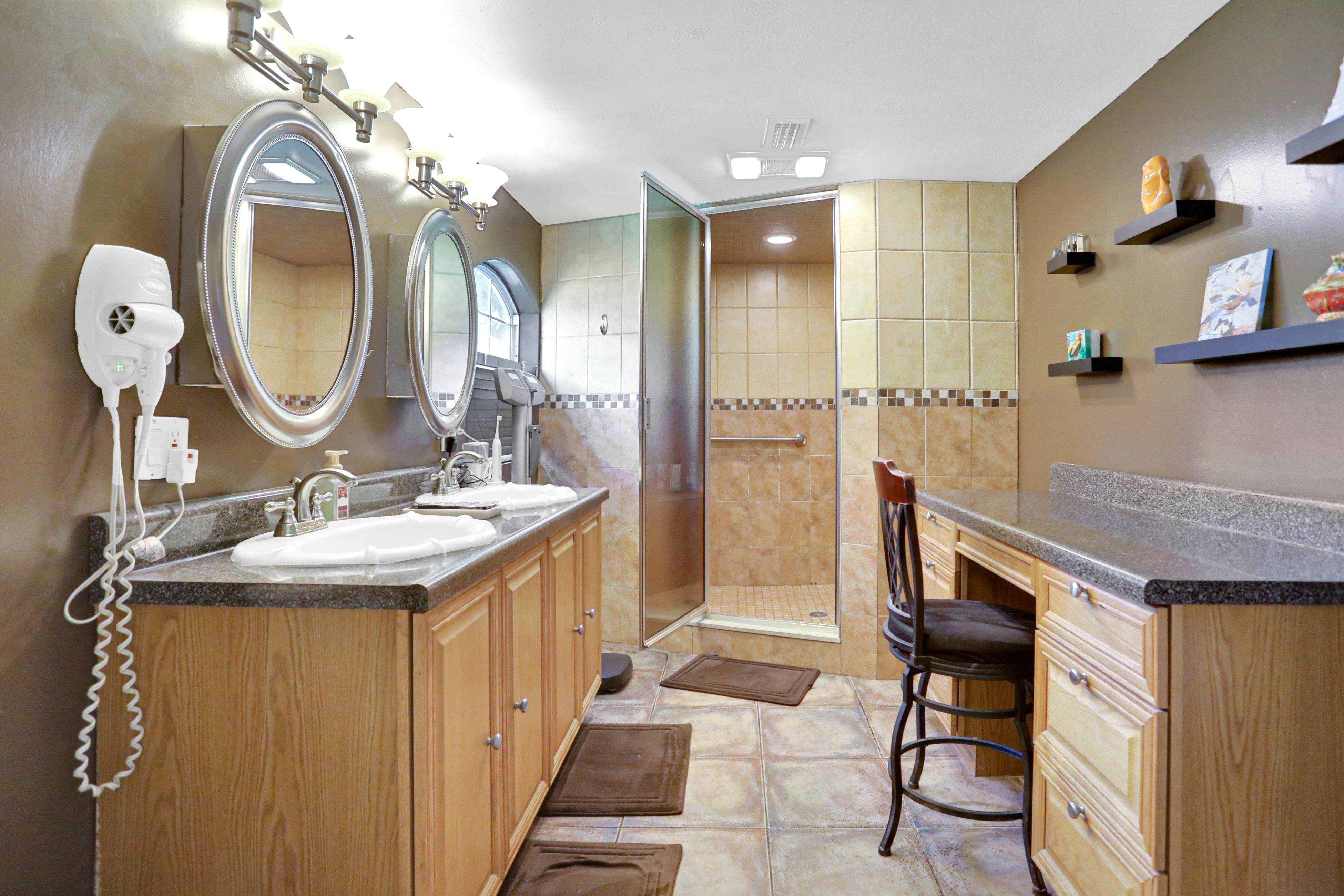 Riverfront retreat with pool/spa, outdoor kitchen, firepit, dock, sauna & games