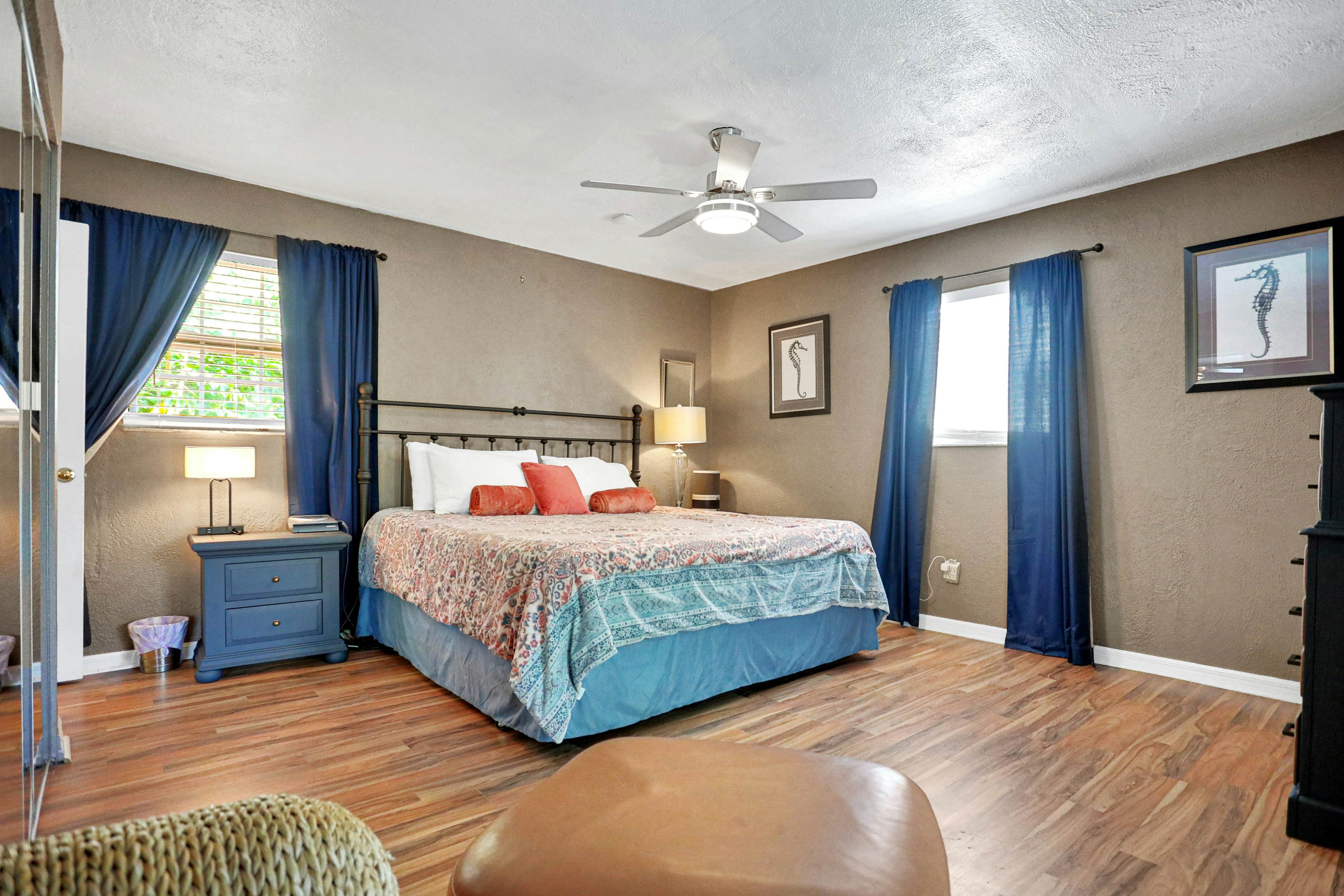 Riverfront retreat with pool/spa, outdoor kitchen, firepit, dock, sauna & games