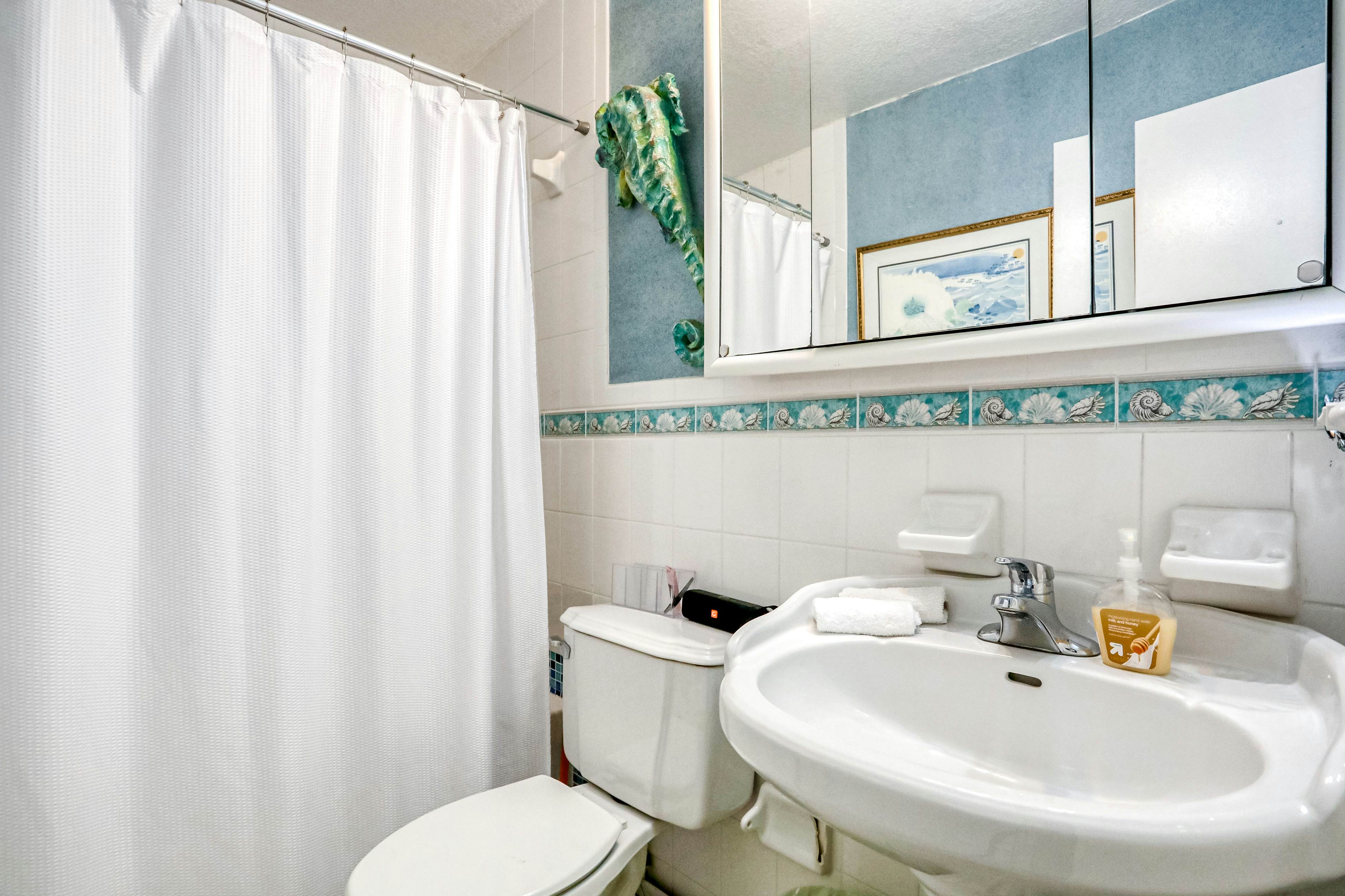 Riverfront retreat with pool/spa, outdoor kitchen, firepit, dock, sauna & games