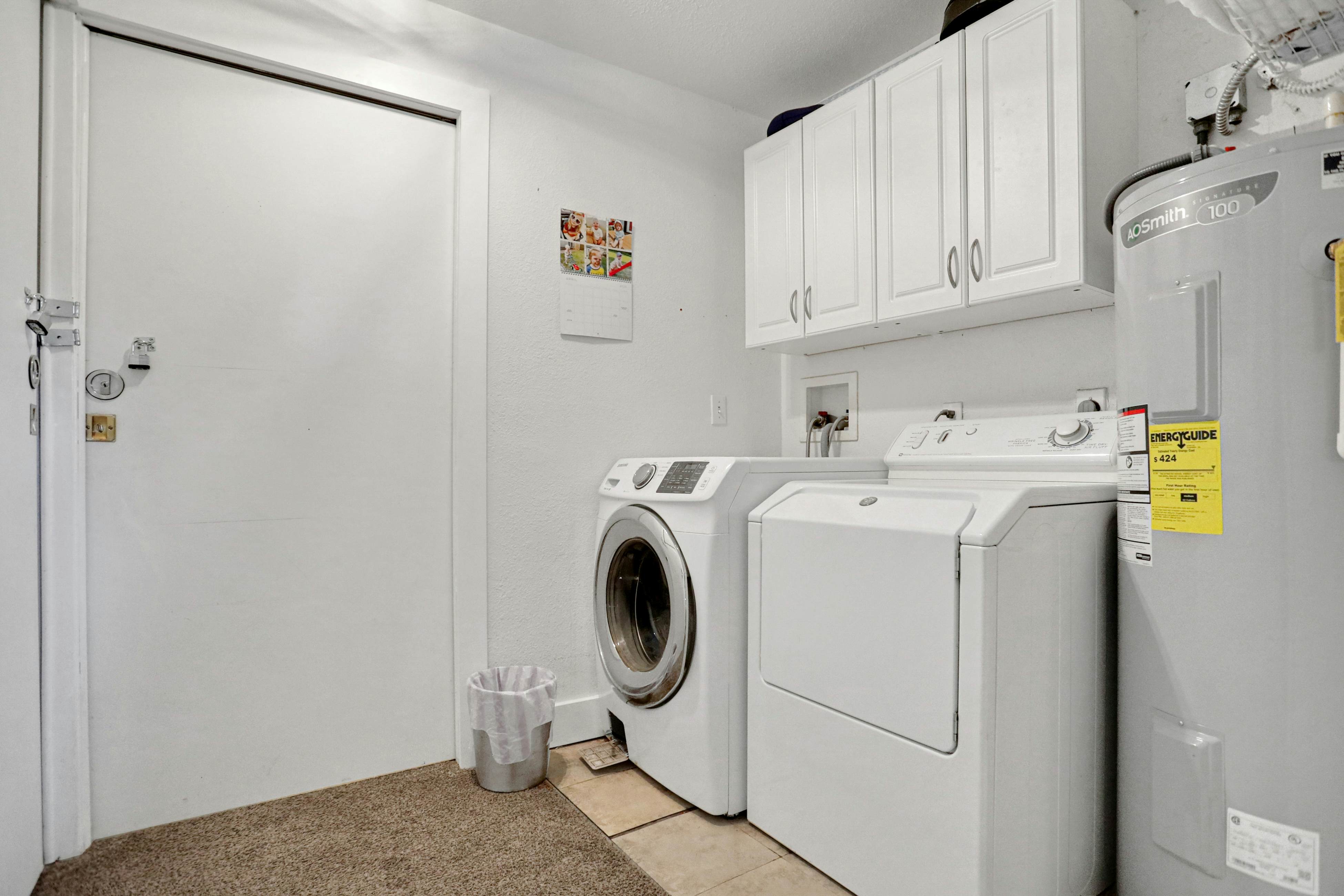 Riverfront retreat with pool/spa, outdoor kitchen, firepit, dock, sauna & games