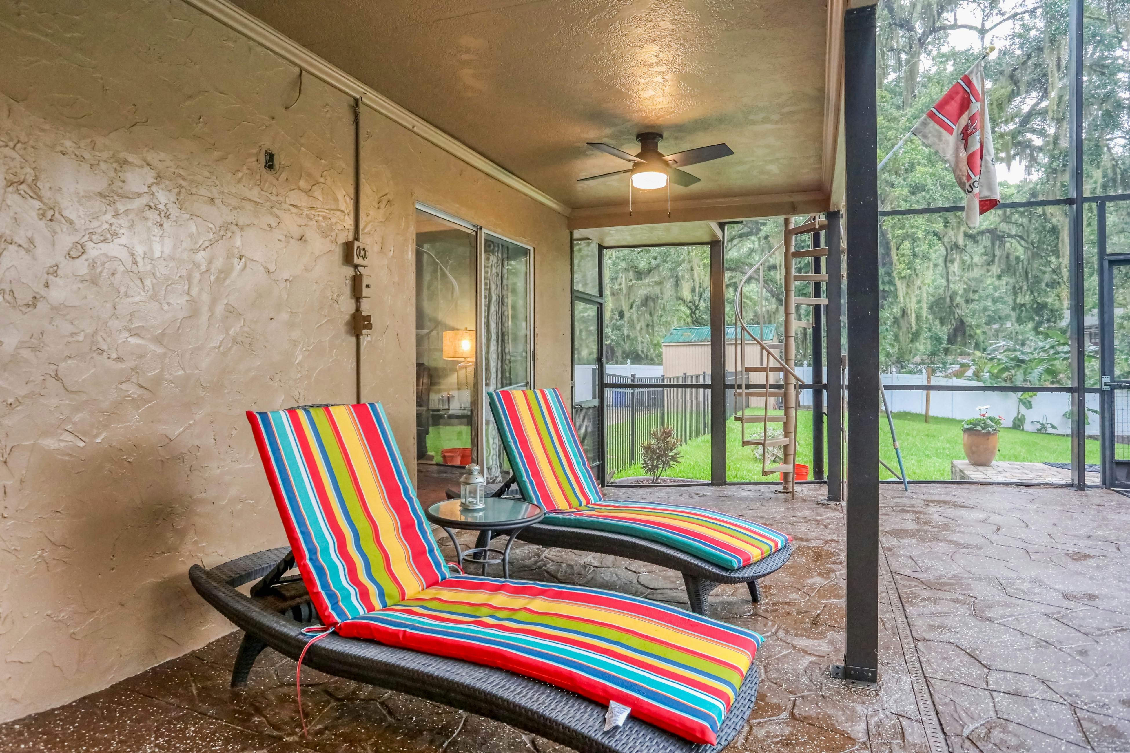 Riverfront retreat with pool/spa, outdoor kitchen, firepit, dock, sauna & games