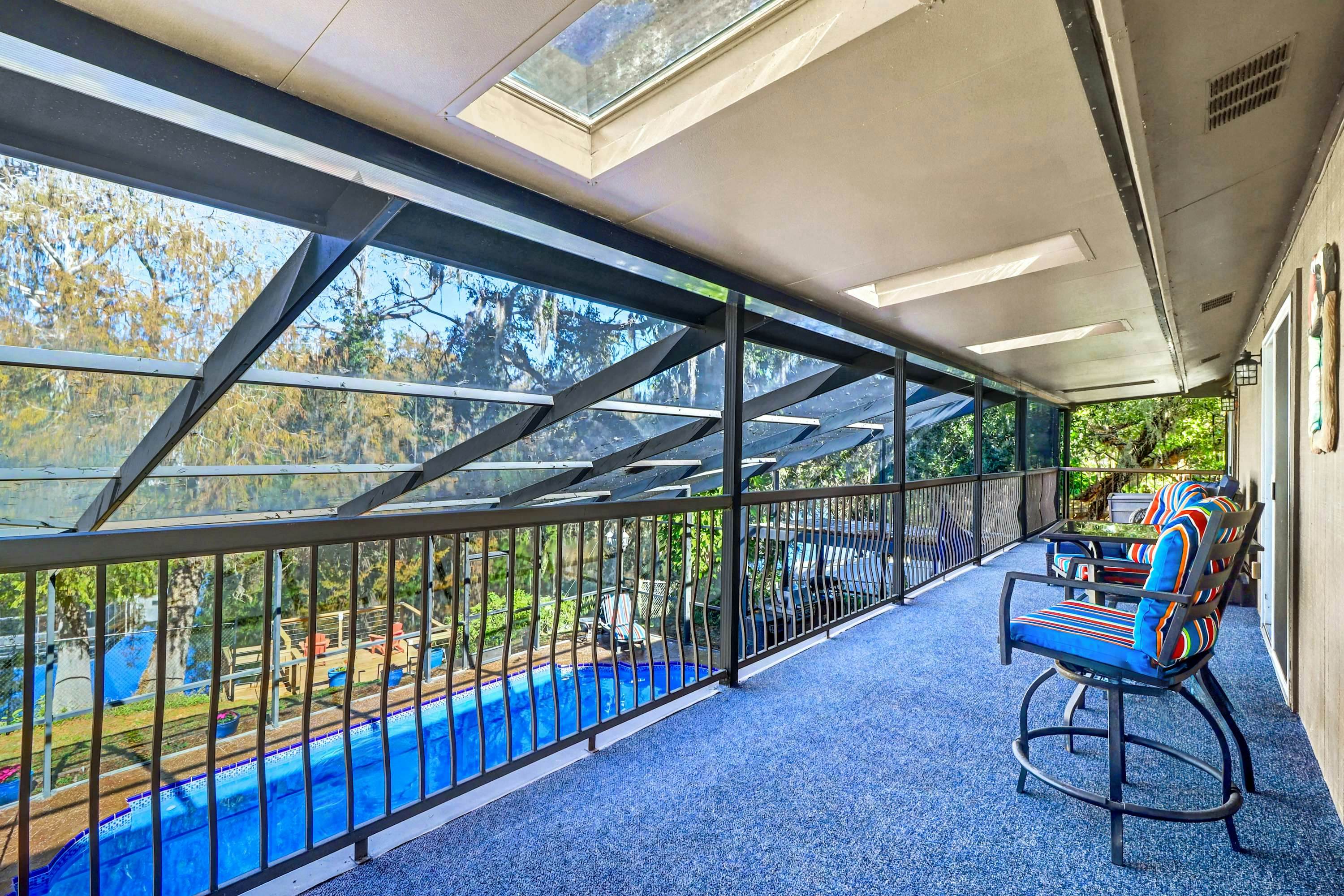 Riverfront retreat with pool spa outdoor kitchen firepit dock sauna and games