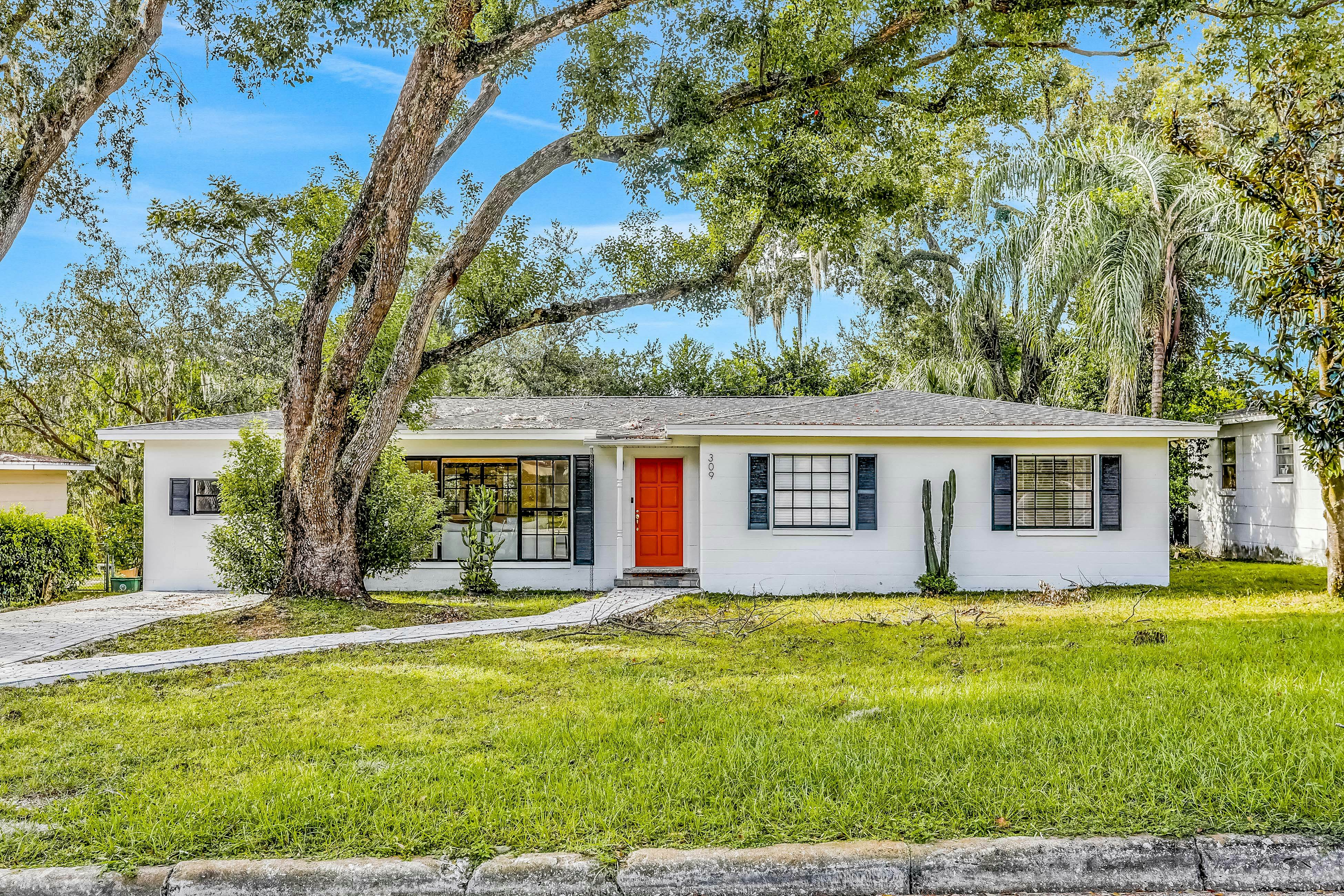 Single-level home with pool, fenced yard, & screened porch + a neighborhood park
