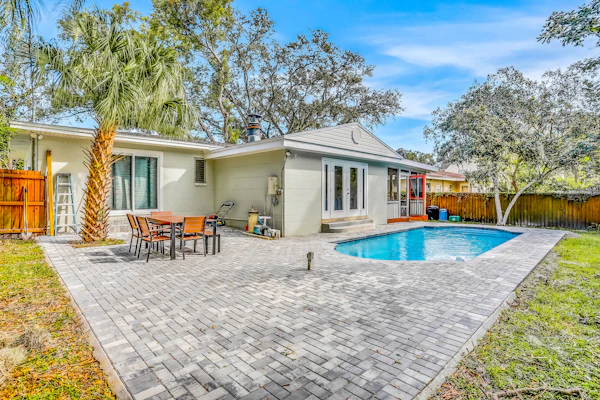 Single level home with pool fenced yard and screened porch a neighborhood park