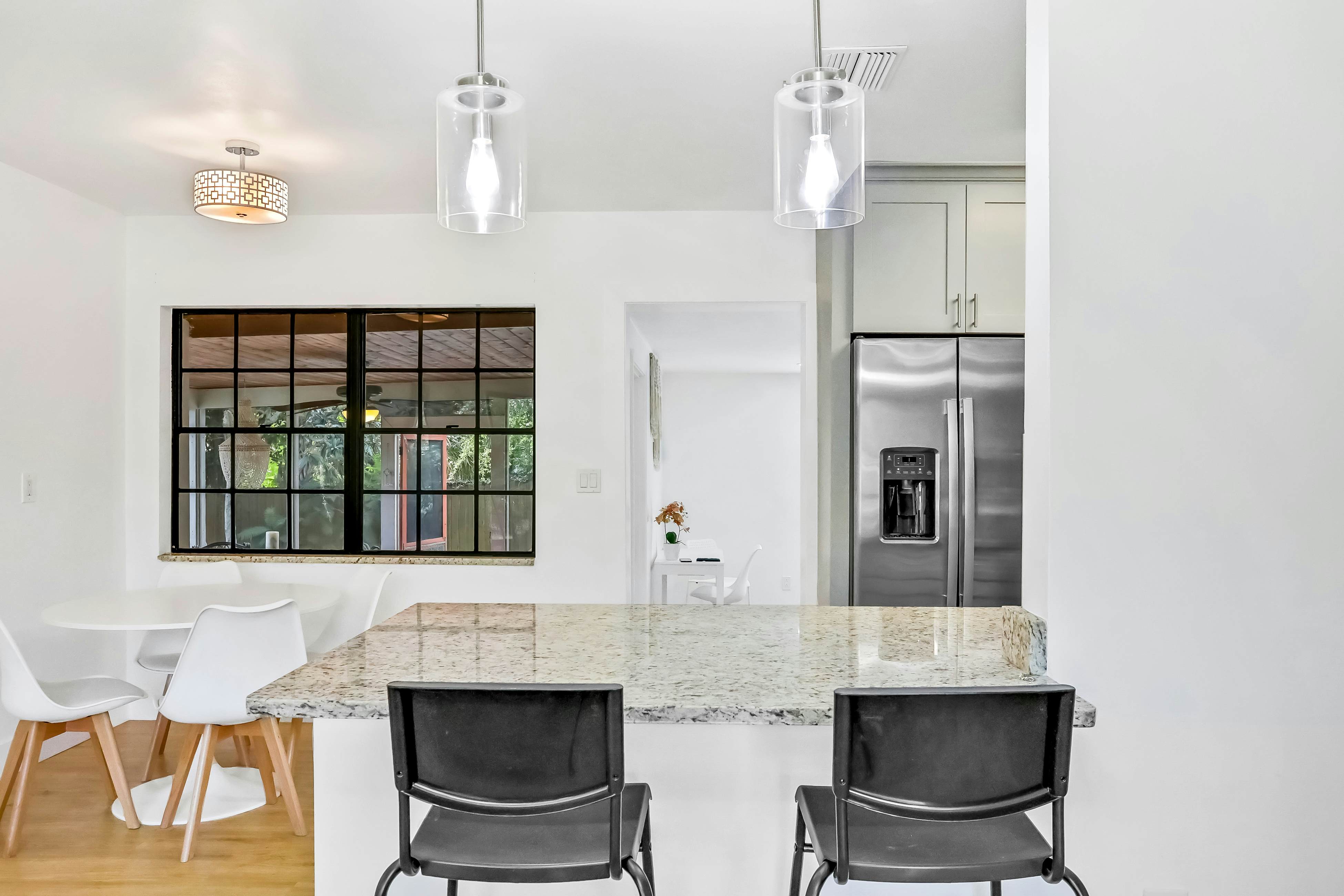 Single-level home with pool, fenced yard, & screened porch + a neighborhood park