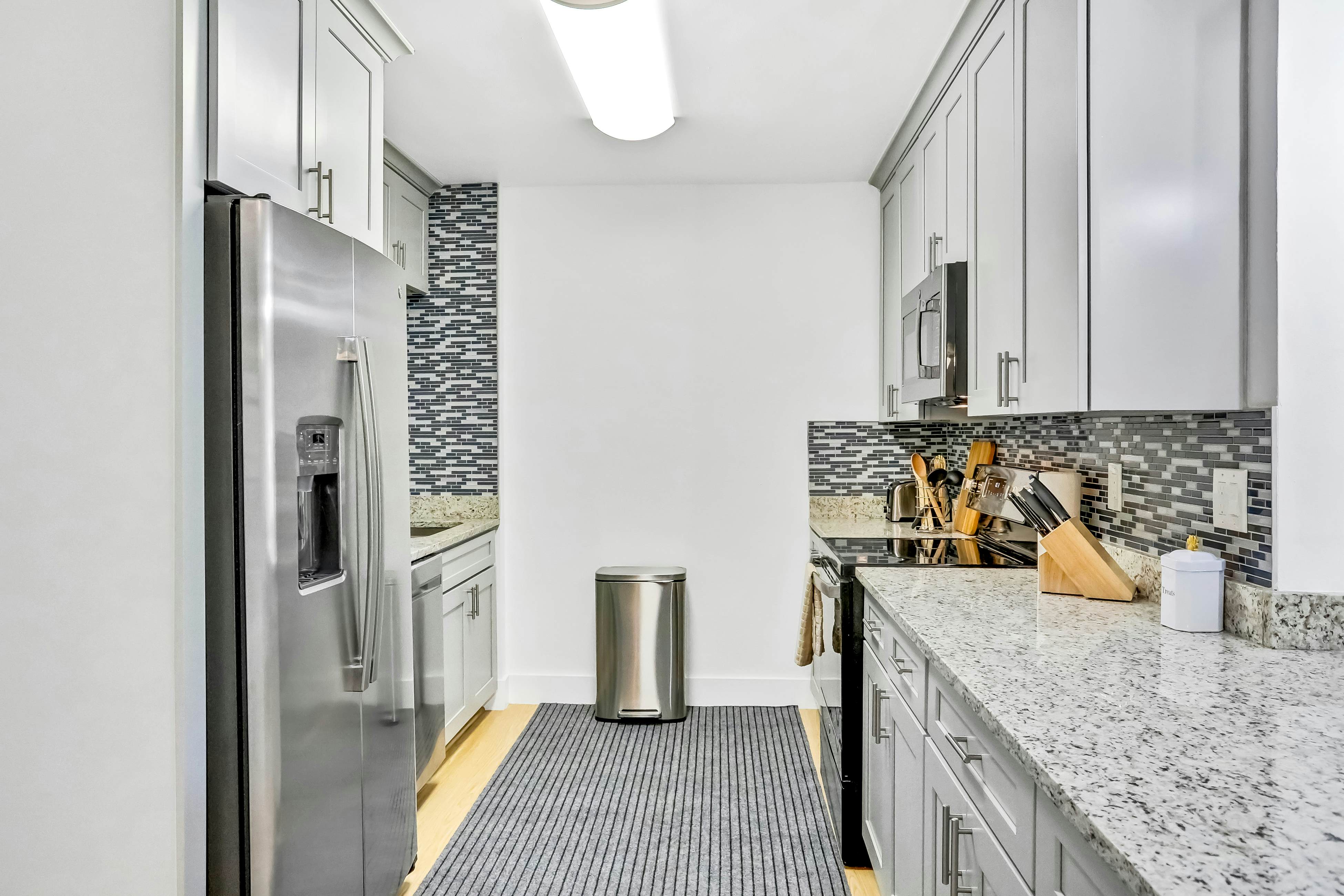 Single-level home with pool, fenced yard, & screened porch + a neighborhood park