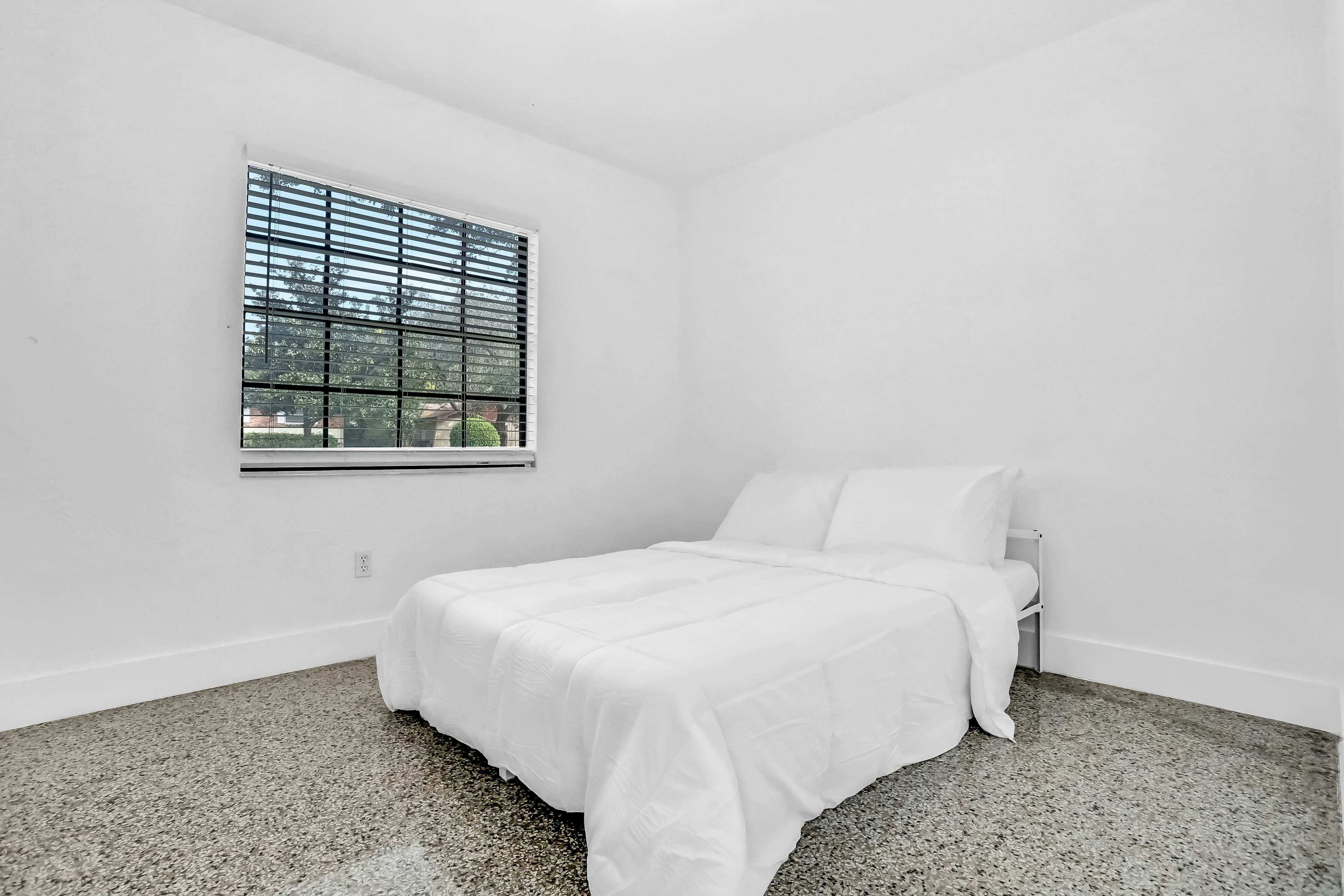 Single-level home with pool, fenced yard, & screened porch + a neighborhood park