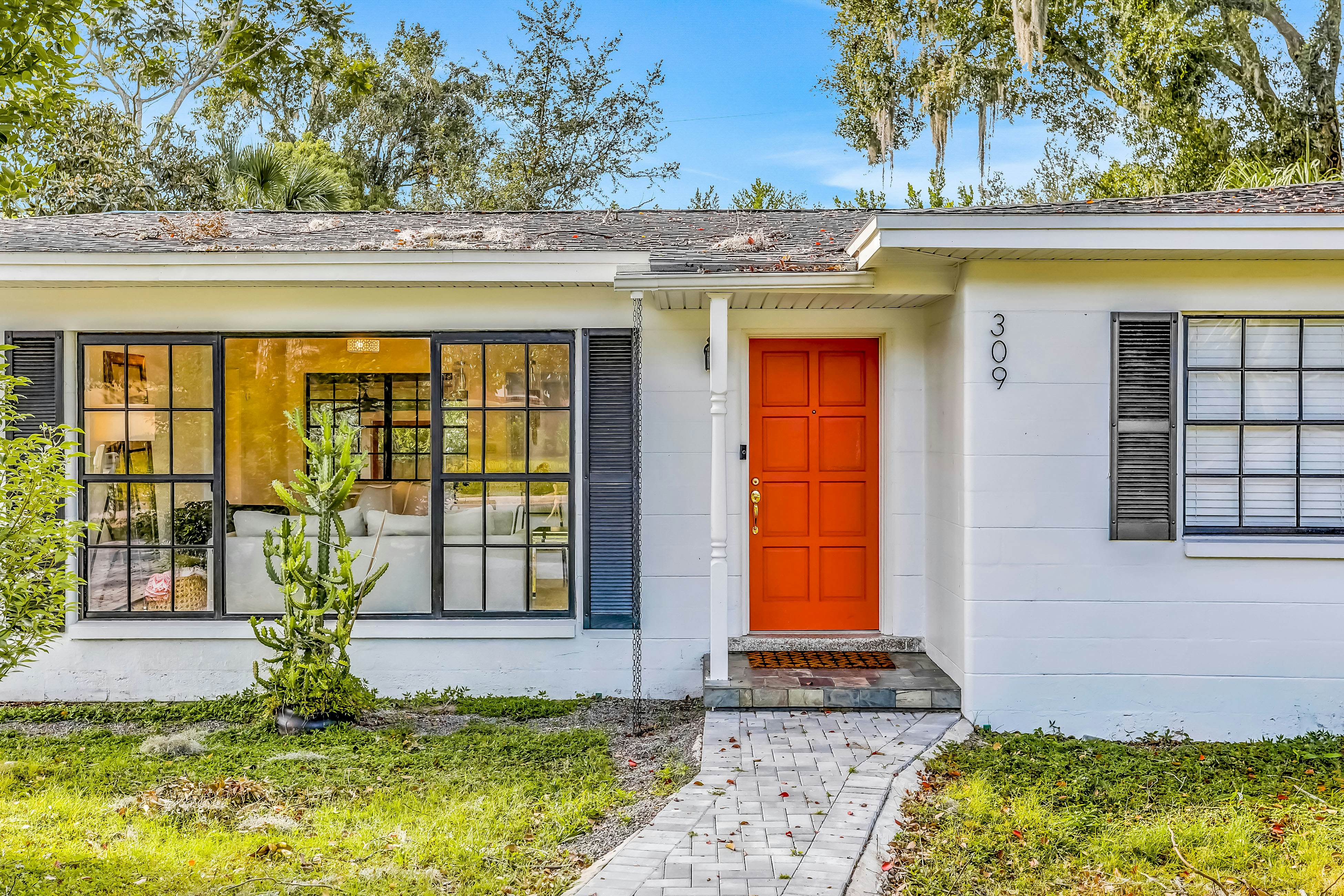 Single-level home with pool, fenced yard, & screened porch + a neighborhood park