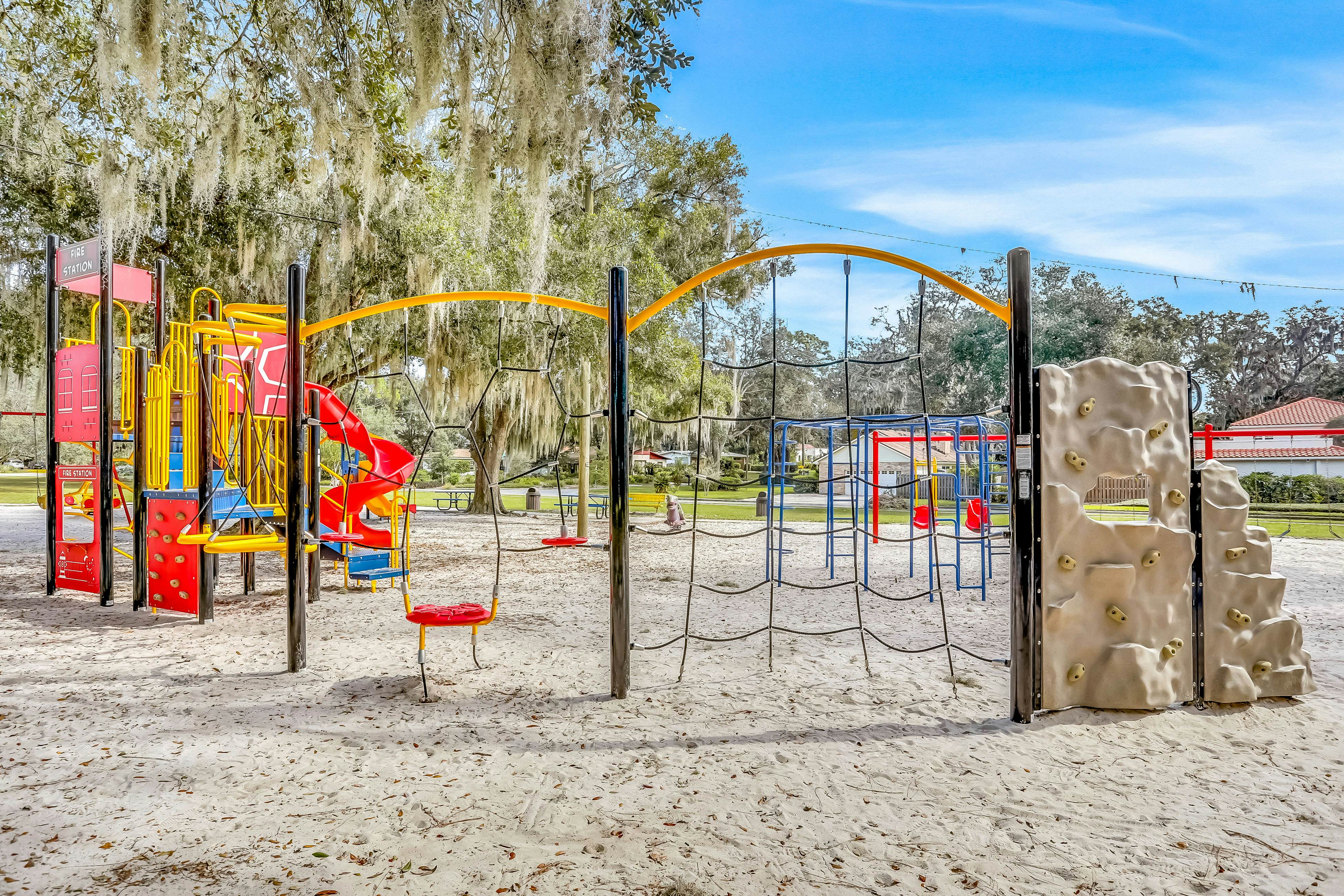 Single-level home with pool, fenced yard, & screened porch + a neighborhood park