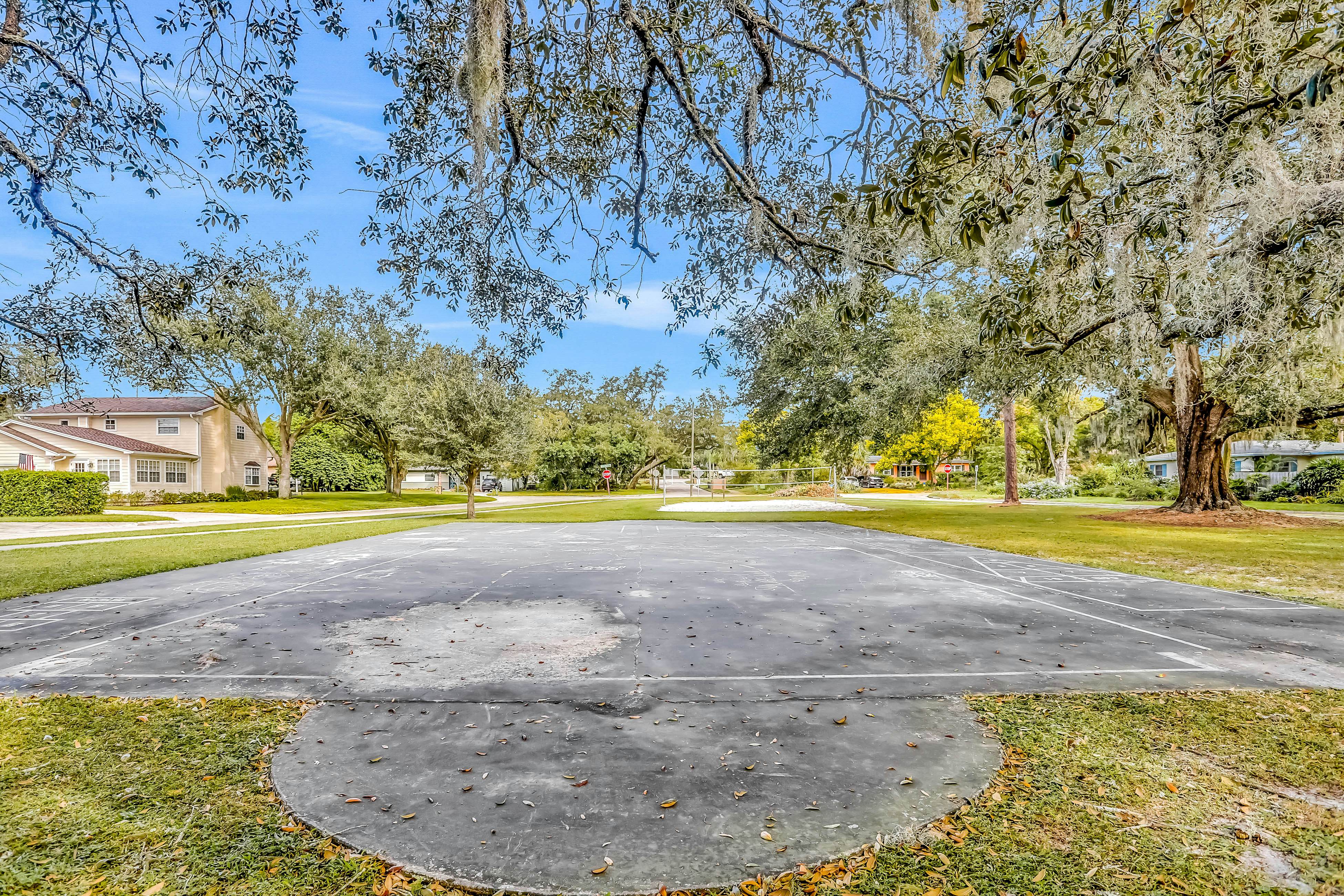 Single-level home with pool, fenced yard, & screened porch + a neighborhood park